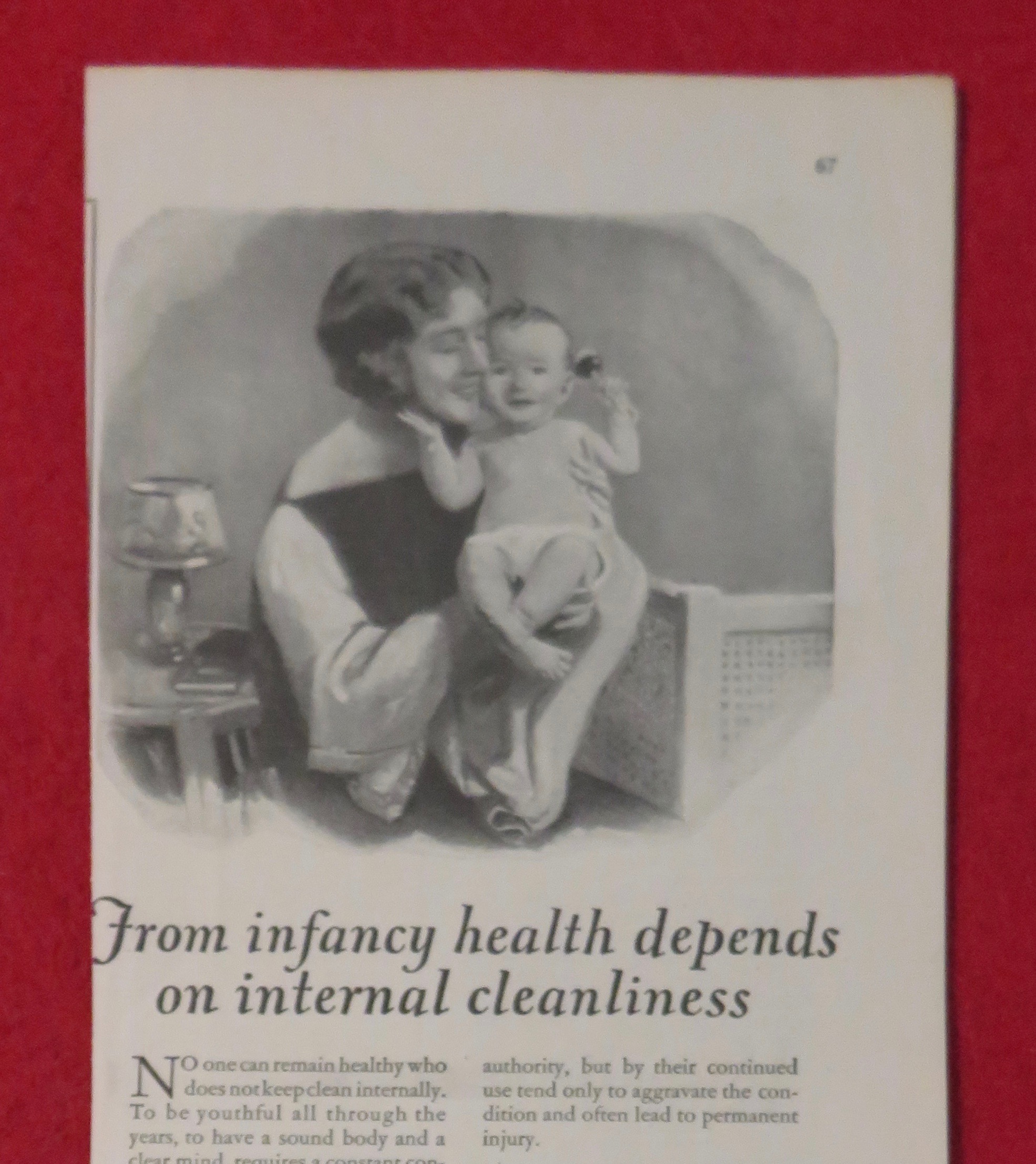 1924 Nujol with Woman Holding A Baby