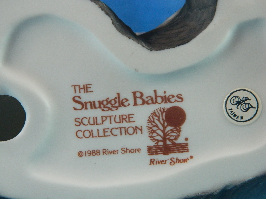 River Shore Porcelain Snuggle Babies Skunk Sleeping