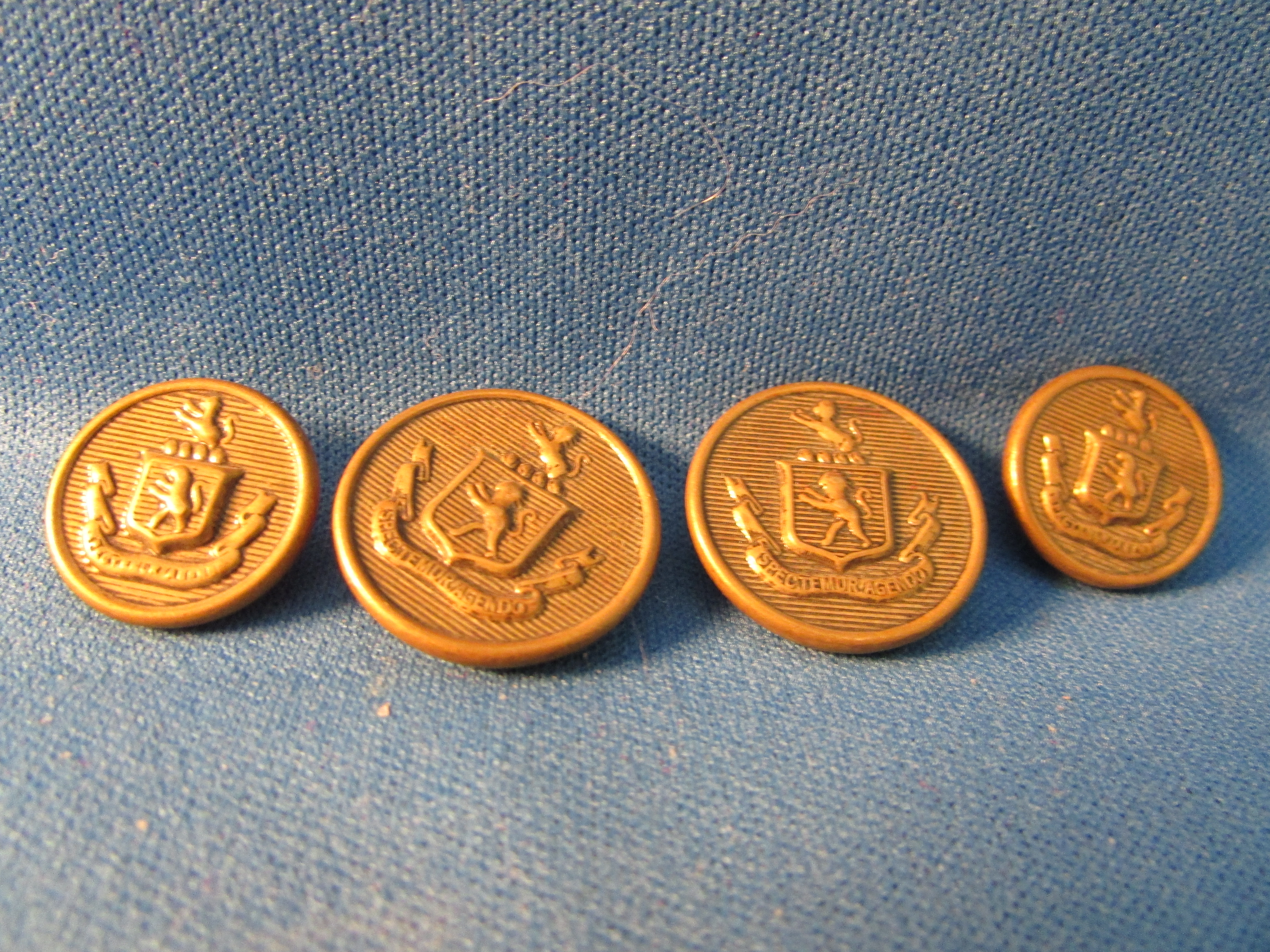 Four Metal Military Buttons