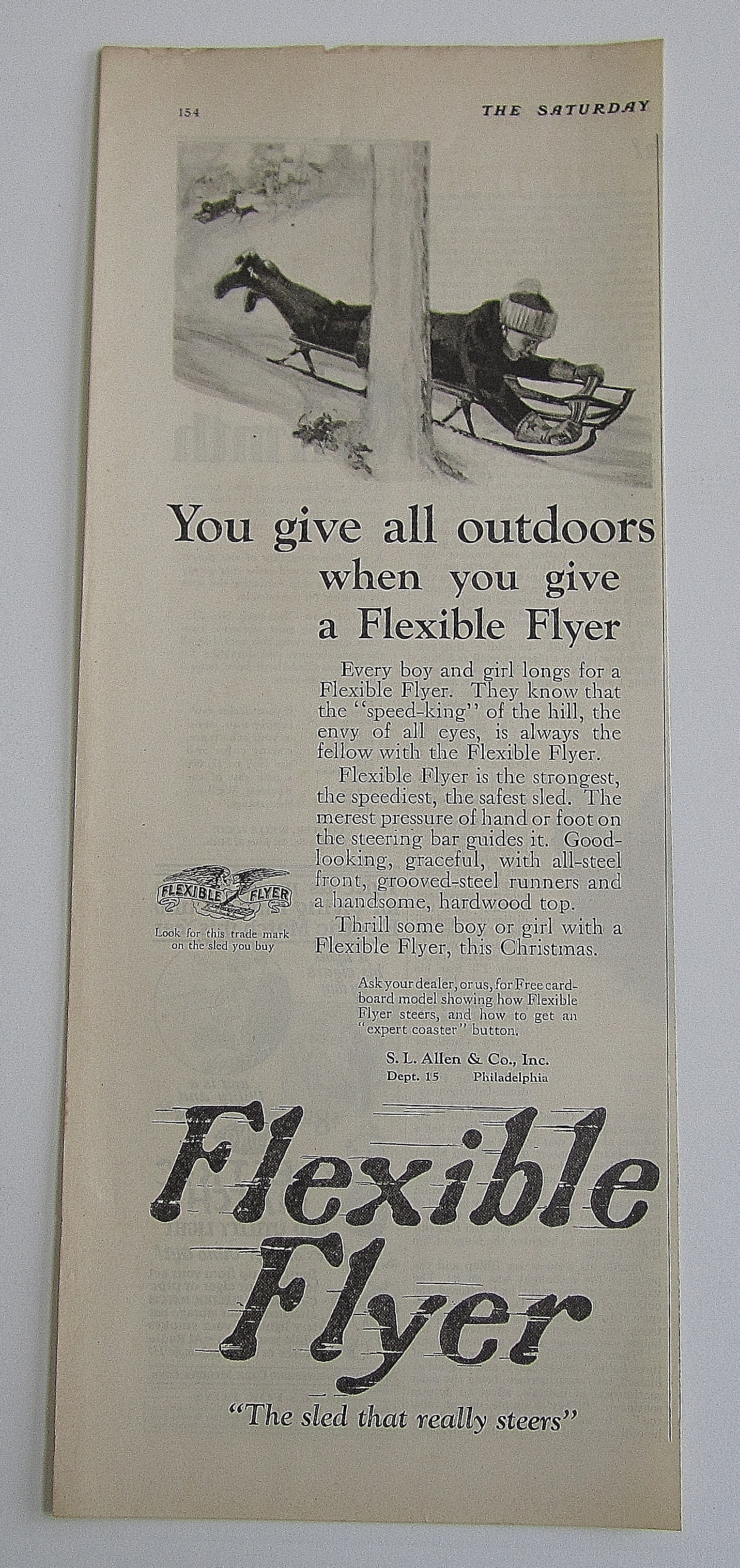 1924 Flexible Flyer With Boy Riding On Sled