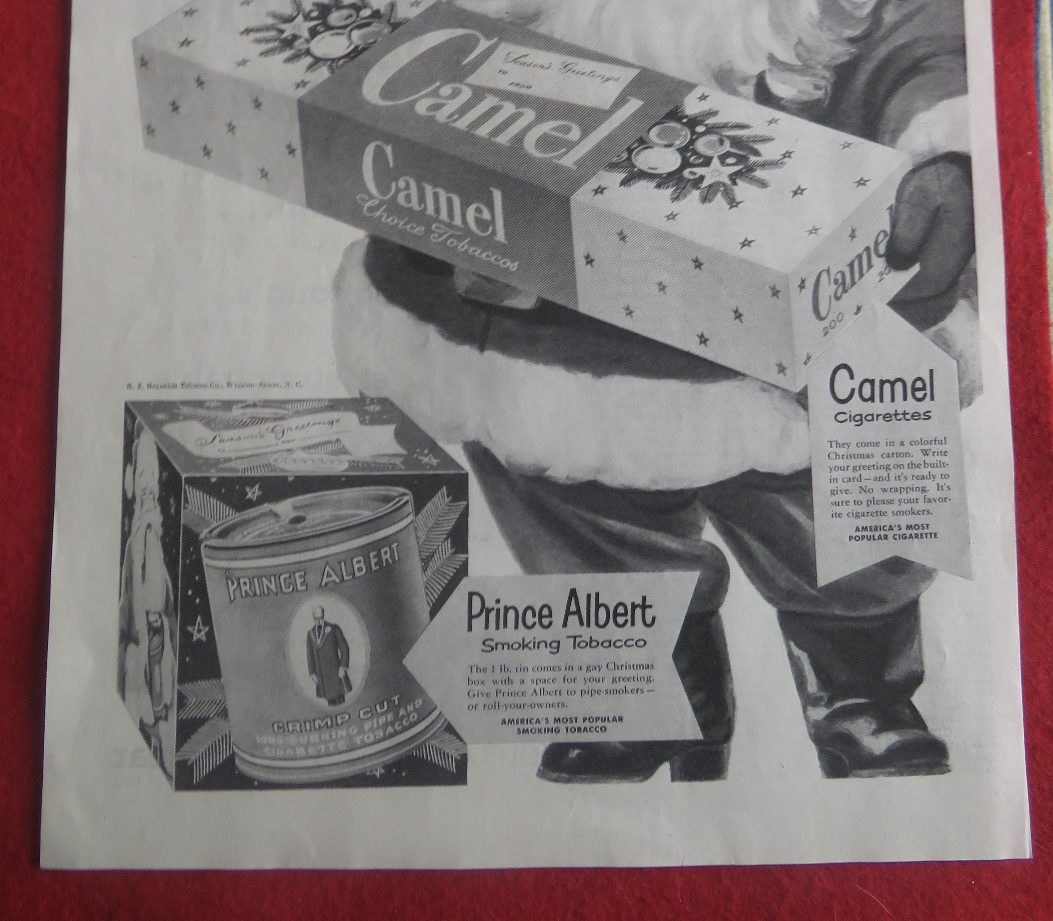 1951 Camel Cigarettes with Santa Claus Holding A Carton