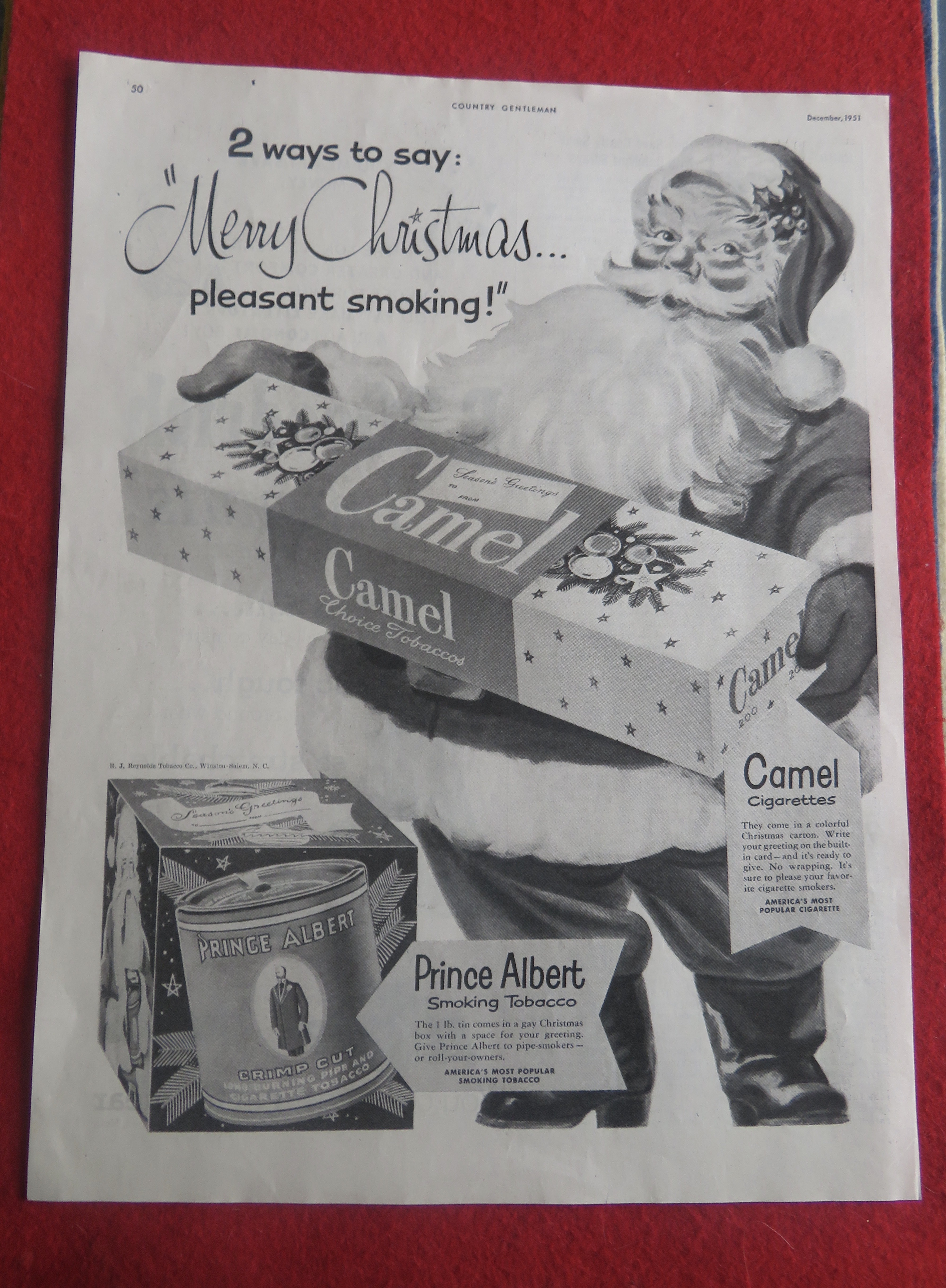 1951 Camel Cigarettes with Santa Claus Holding A Carton