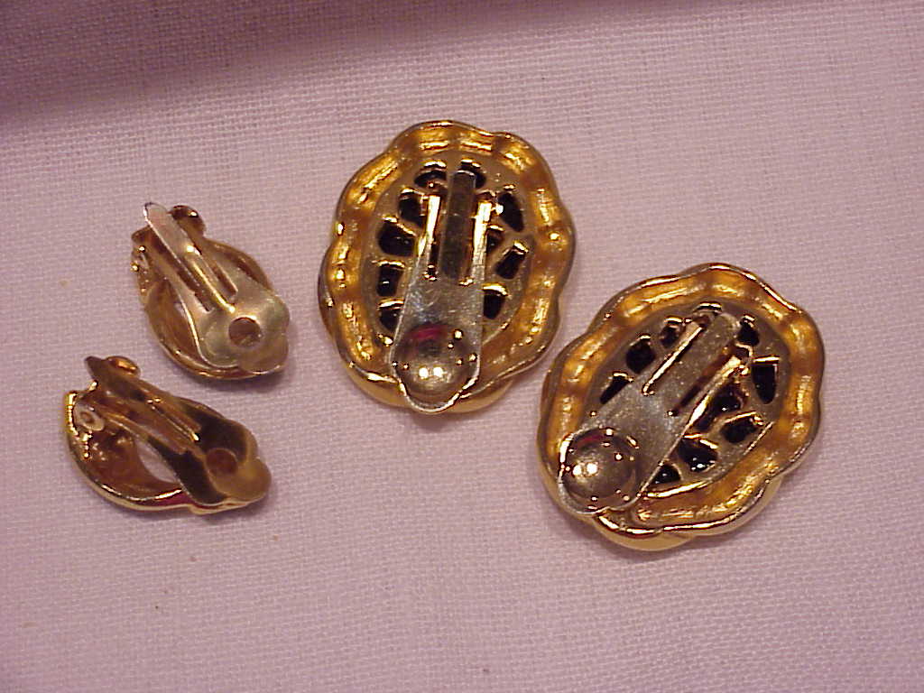 2 Pair Of Black And Gold Tone Clip Earrings