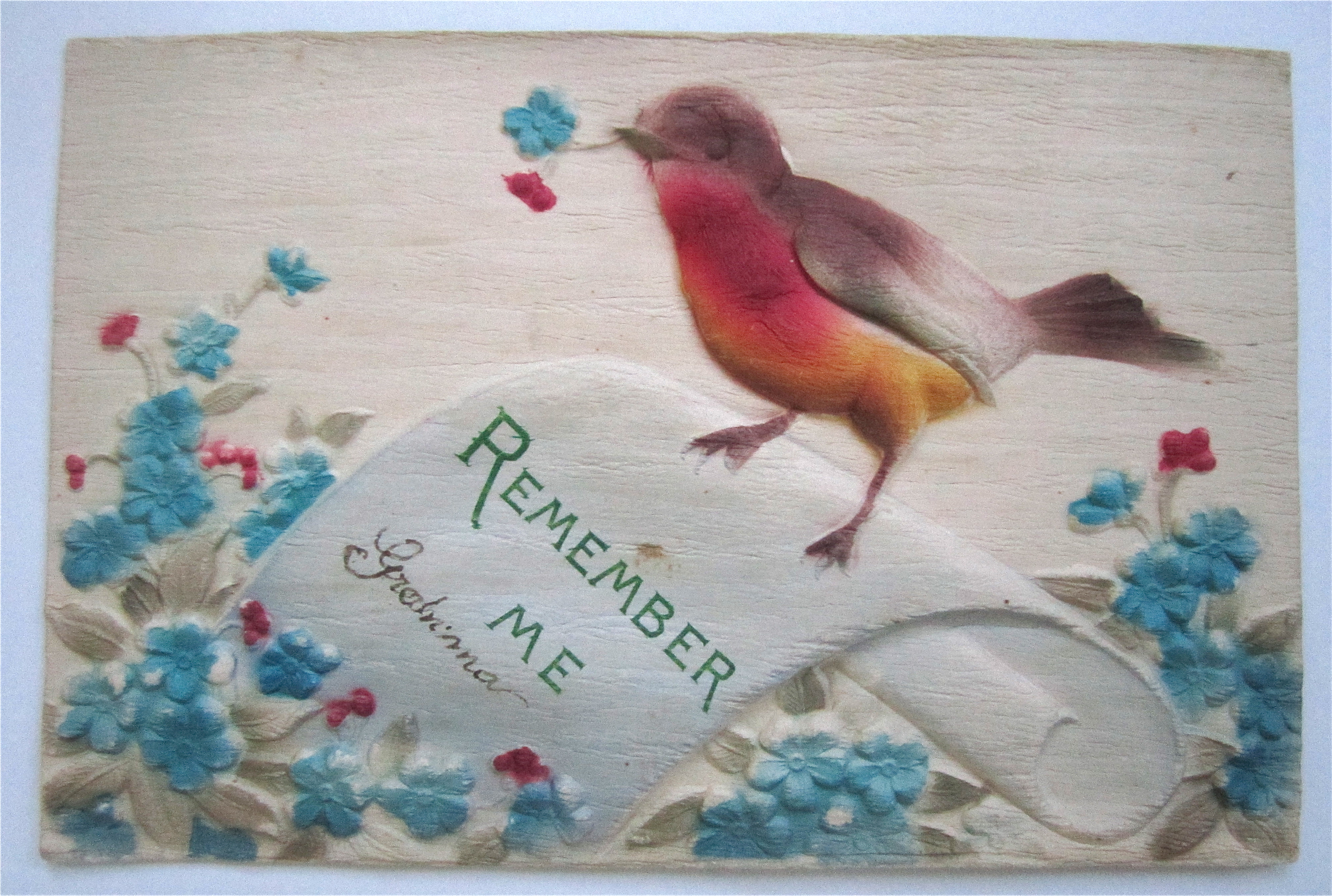 A Bird With Flowers In Its Mouth Postcard