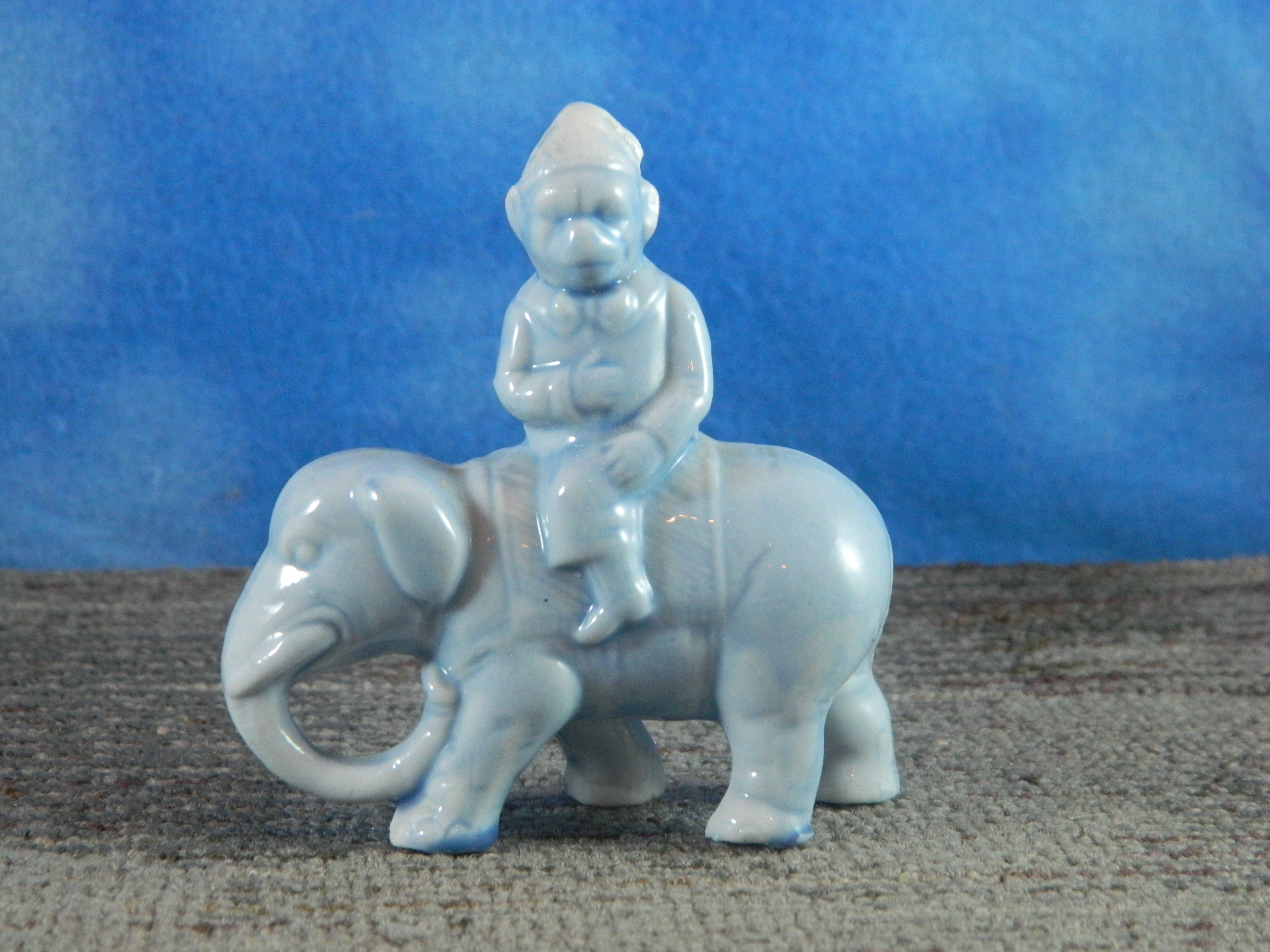 Vintage Porcelain Blue Dressed Chimp Riding Elephant