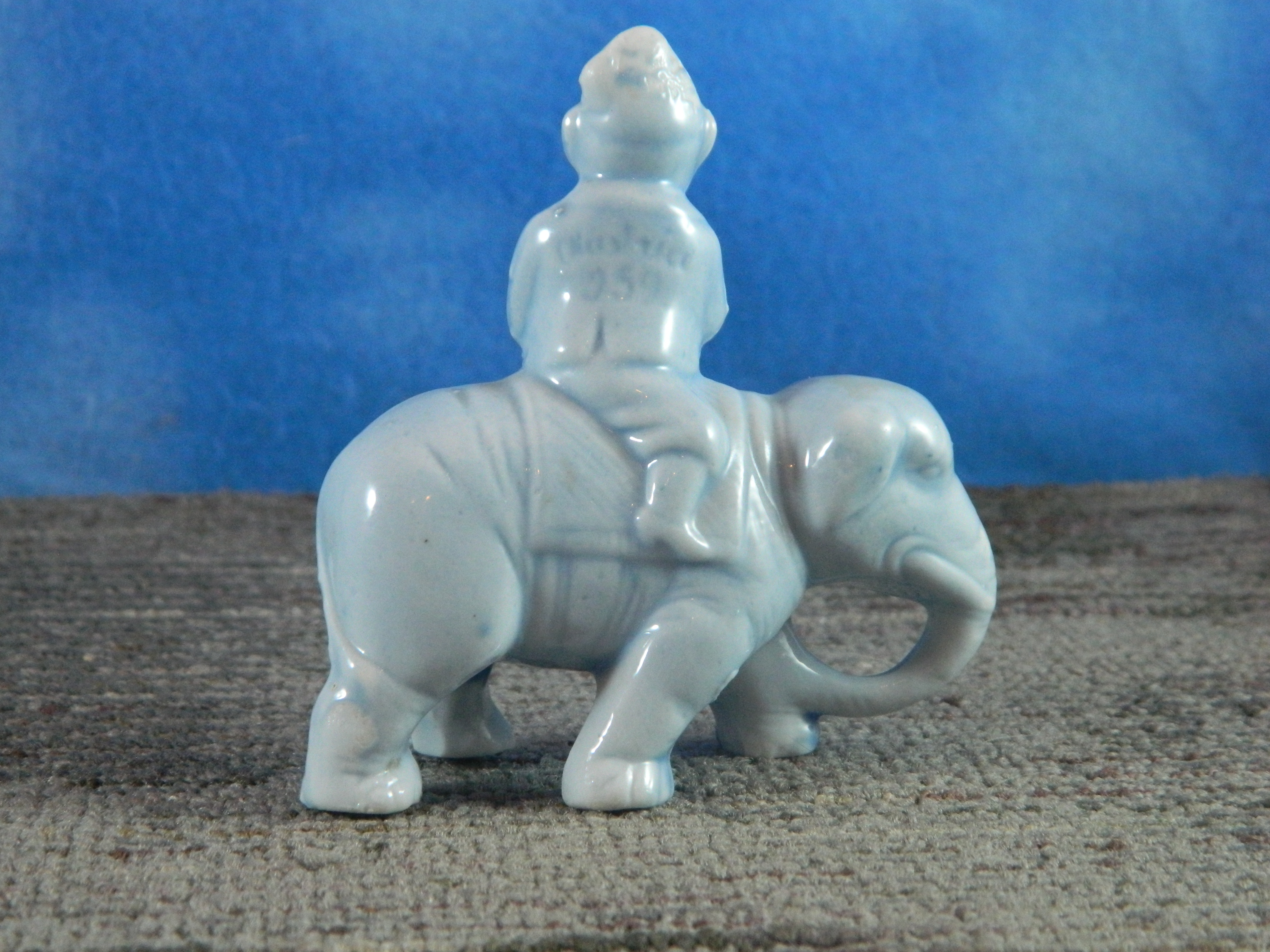 Vintage Porcelain Blue Dressed Chimp Riding Elephant