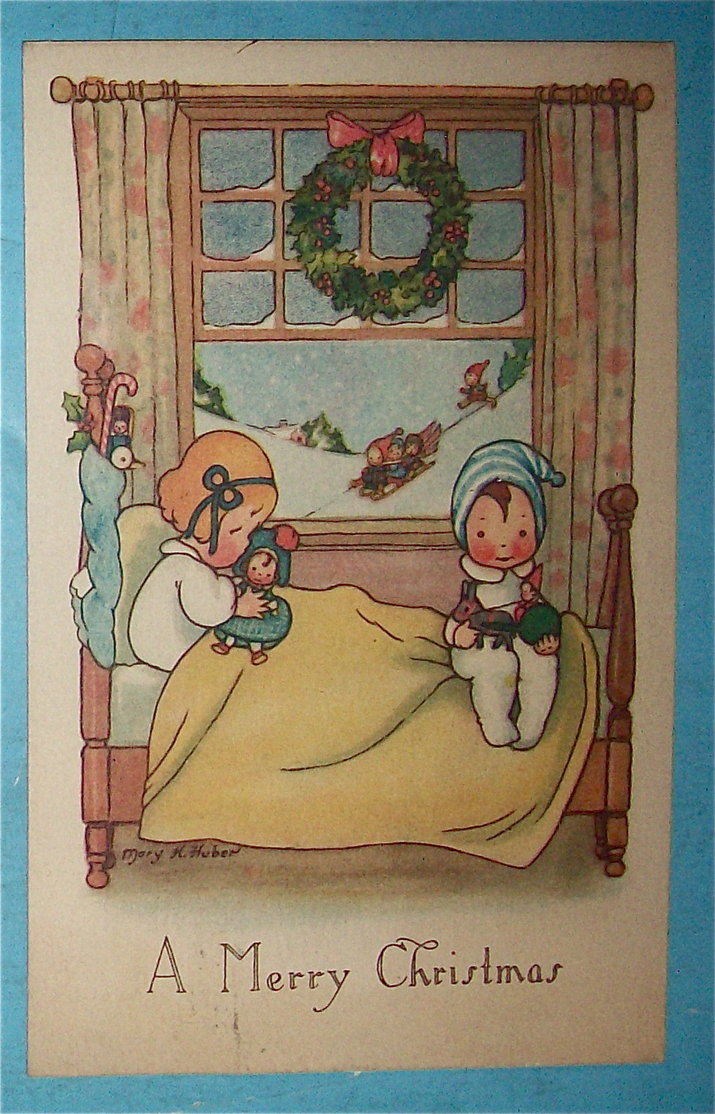 A Merry Christmas Postcard w/Two Children on Bed