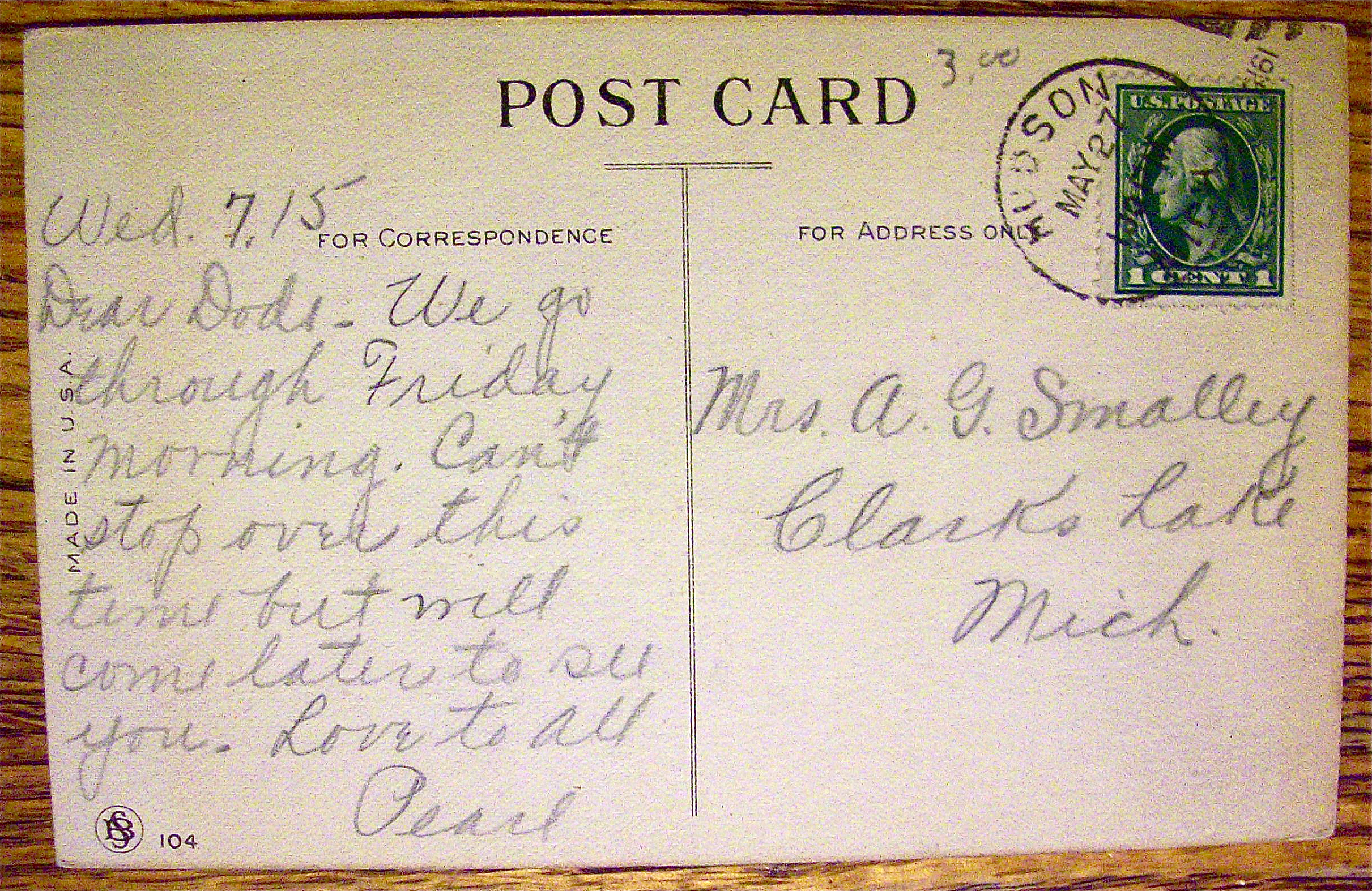Puppy Having A Fire Pick Thrown At It Postcard