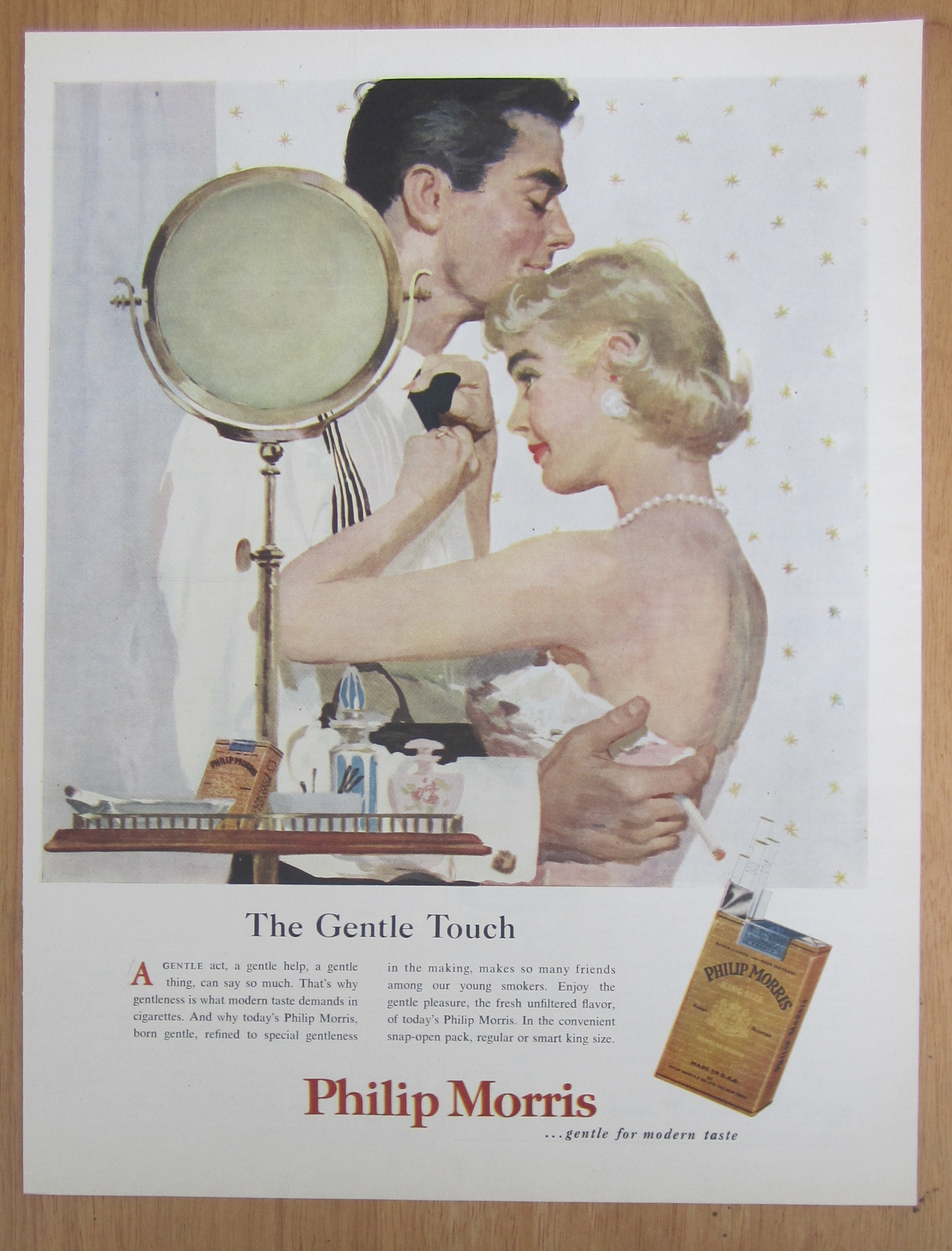 1955 Philip Morris Cigarettes w/Woman Fixing Man's Tie