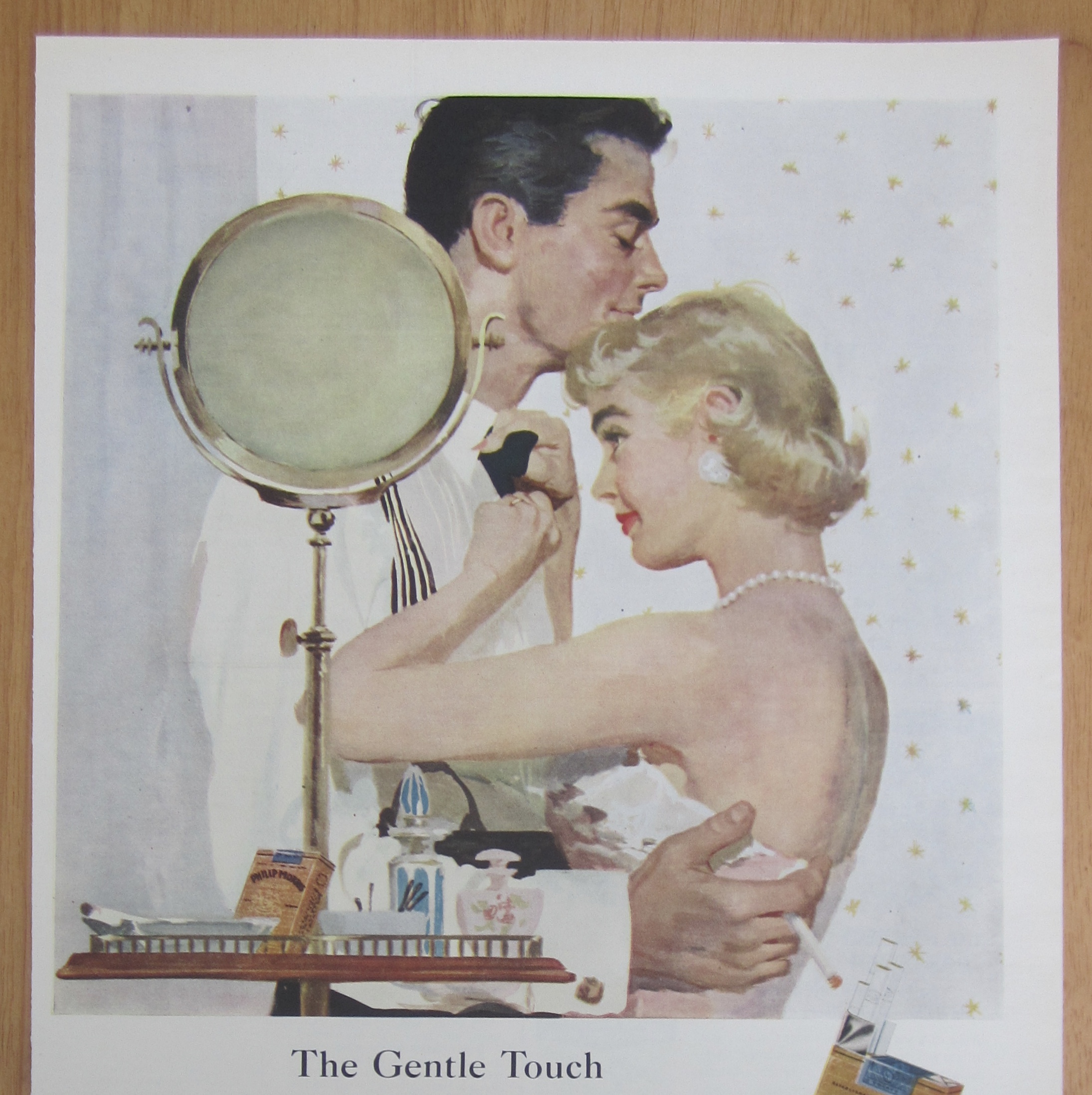 1955 Philip Morris Cigarettes w/Woman Fixing Man's Tie