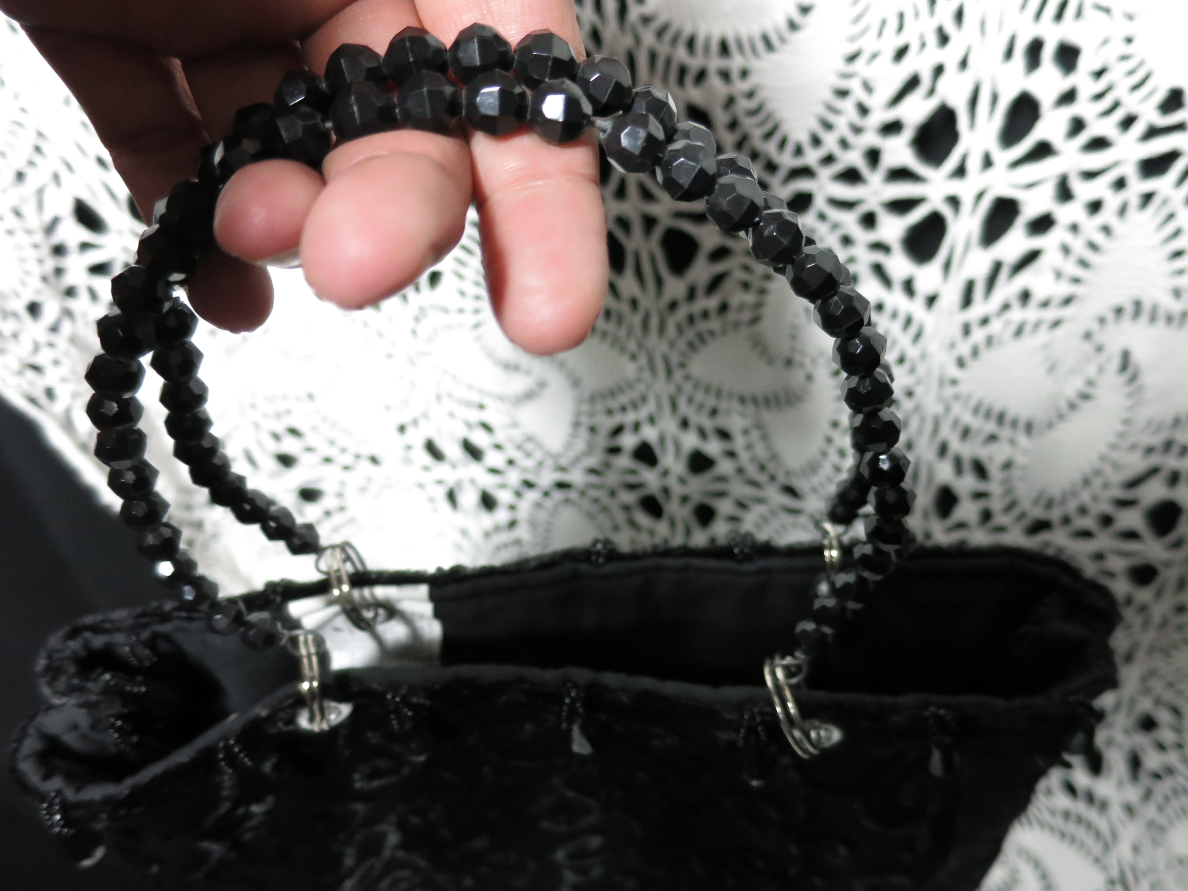 Black Handbag with Beaded handles and Tassel Trim