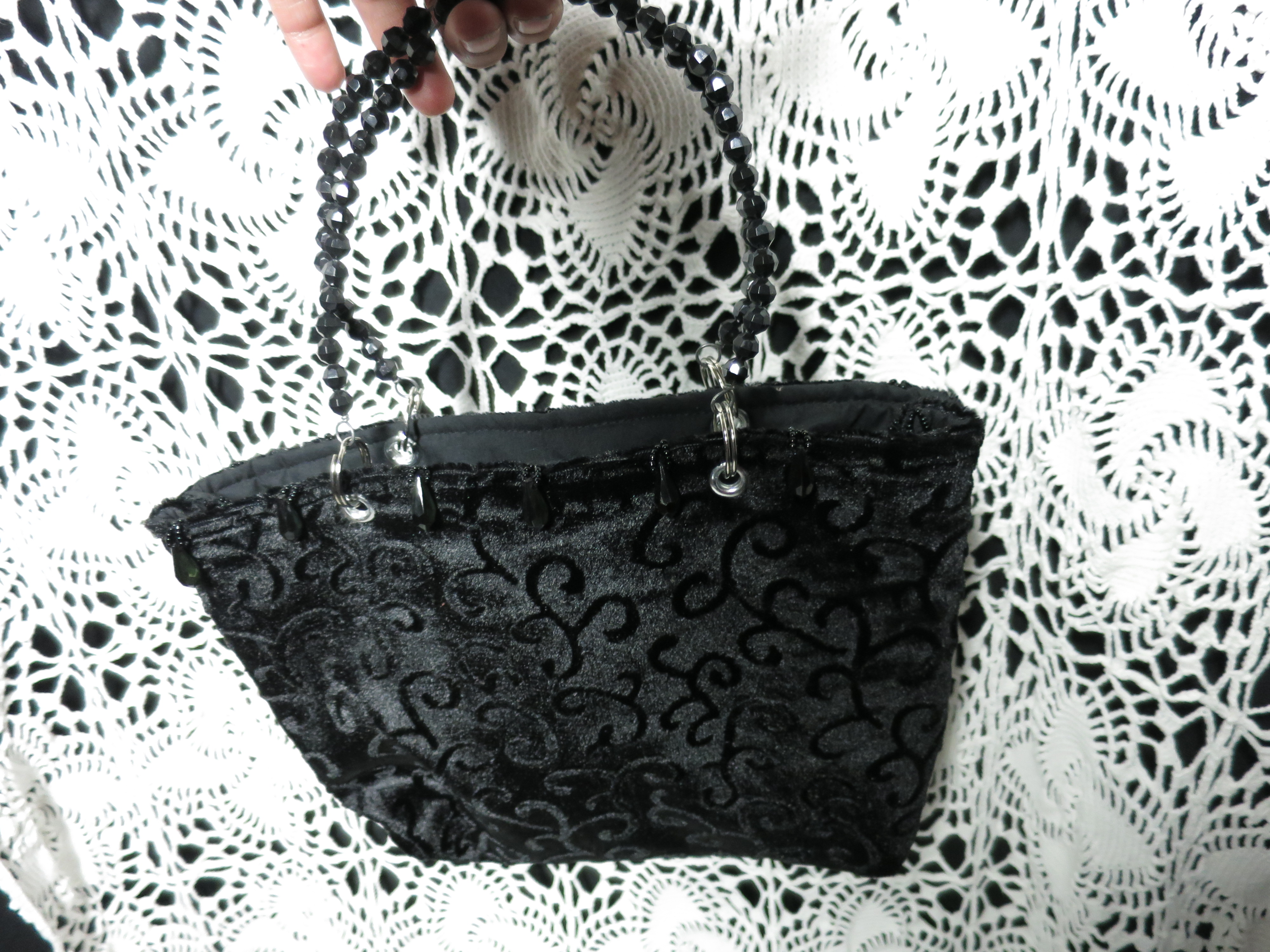 Black Handbag with Beaded handles and Tassel Trim