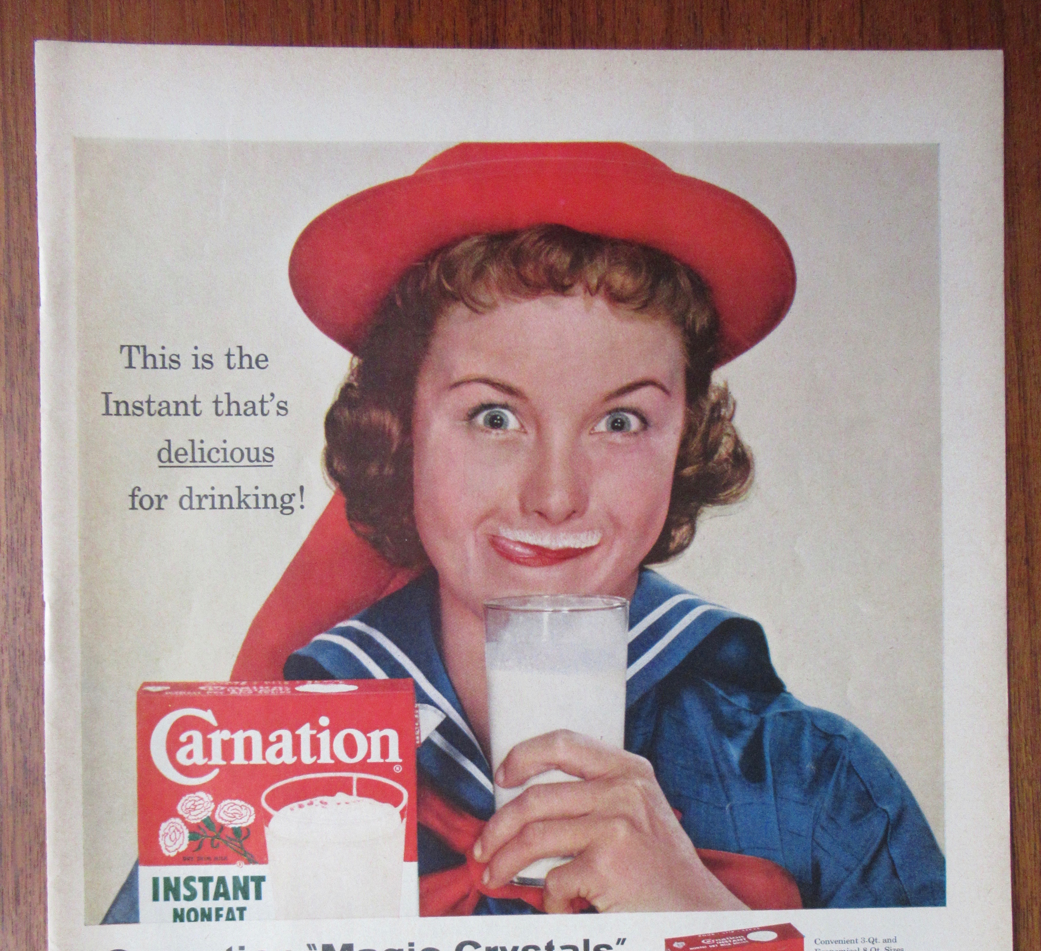 1958 Carnation Instant Dry Milk with Woman Smiling