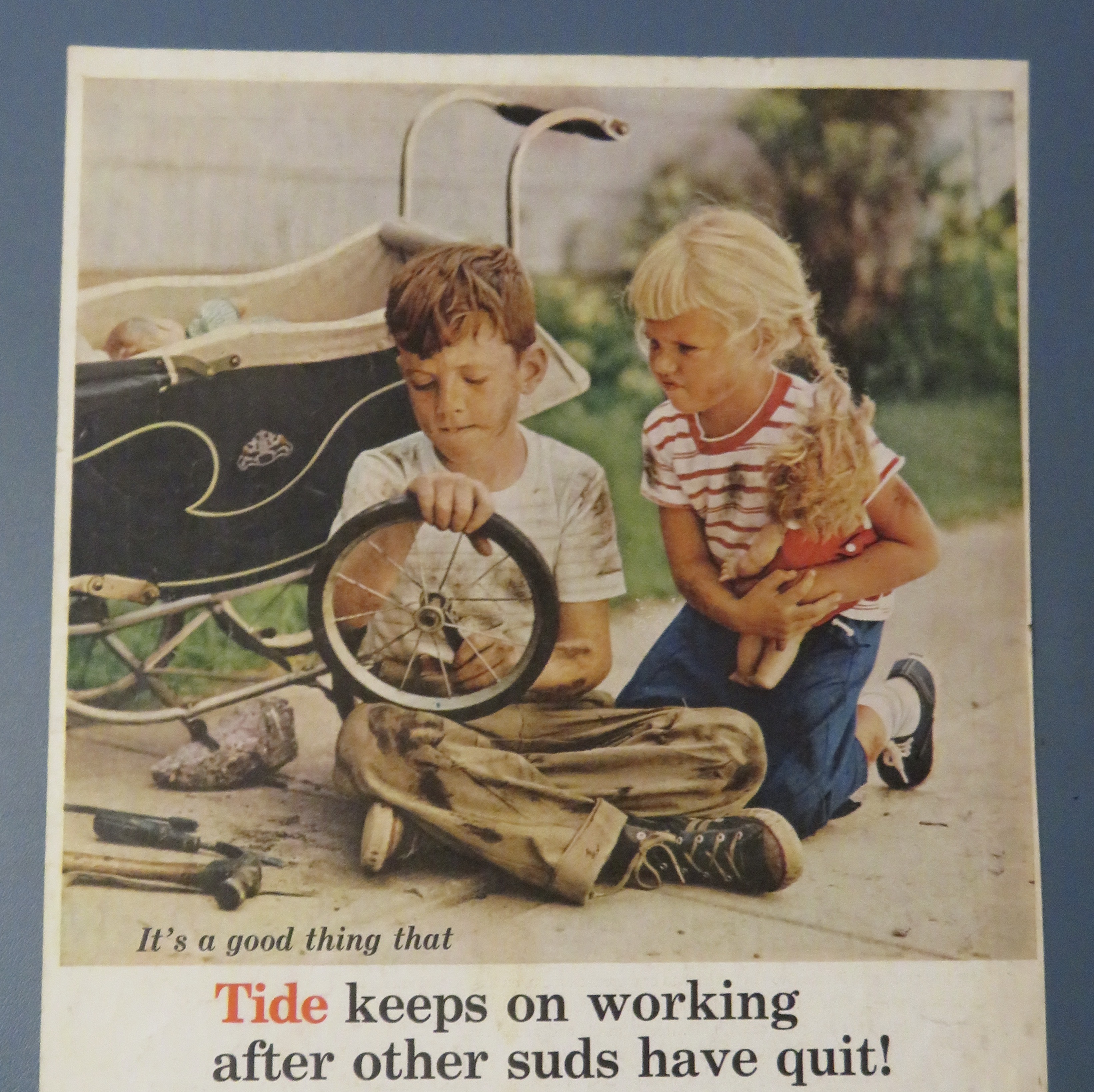 1960 Tide Detergent w/ Boy Fixing Girl's Doll Stroller