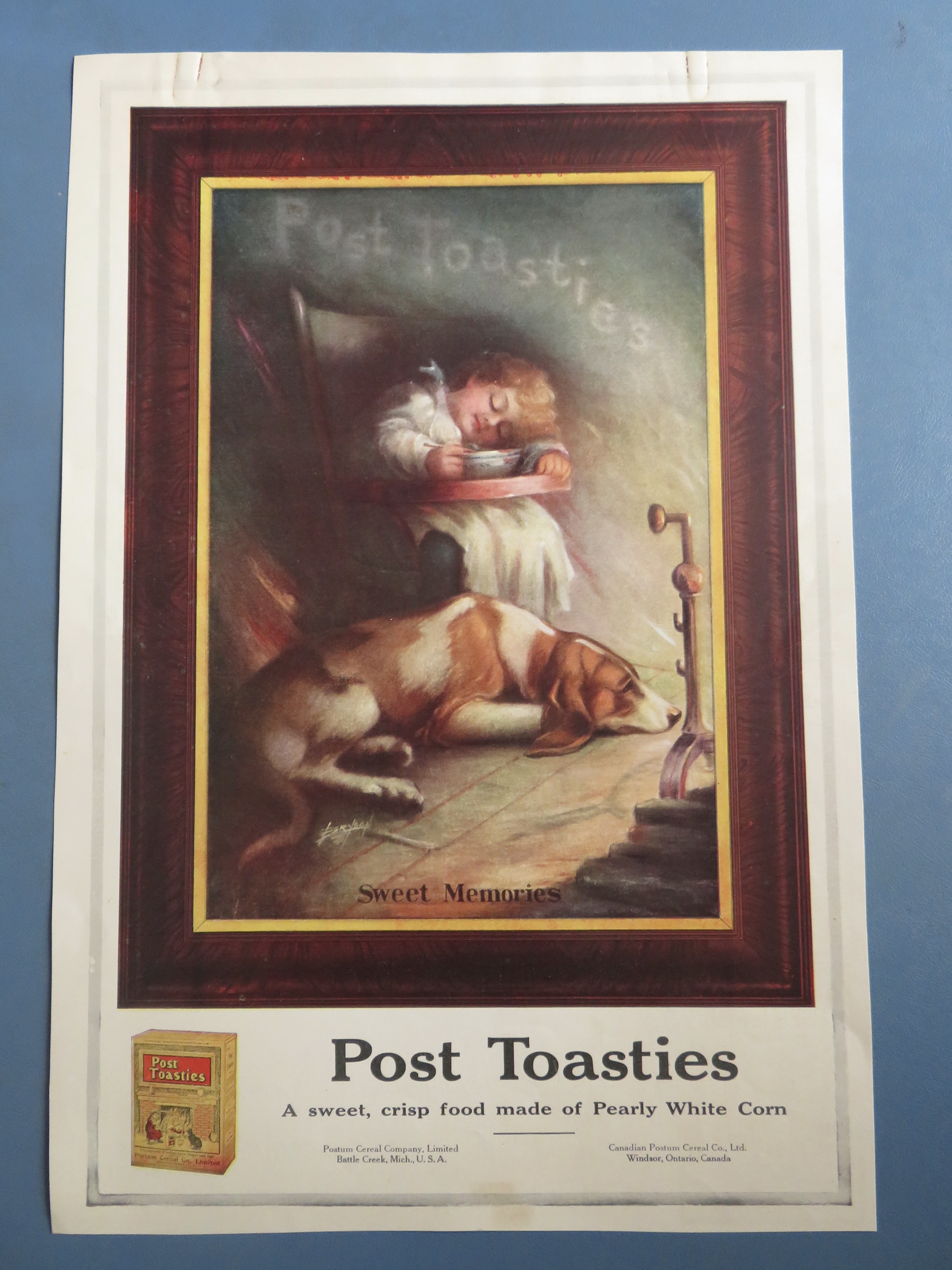 1917 Post Toasties Cereal with Child Sleeping in Chair
