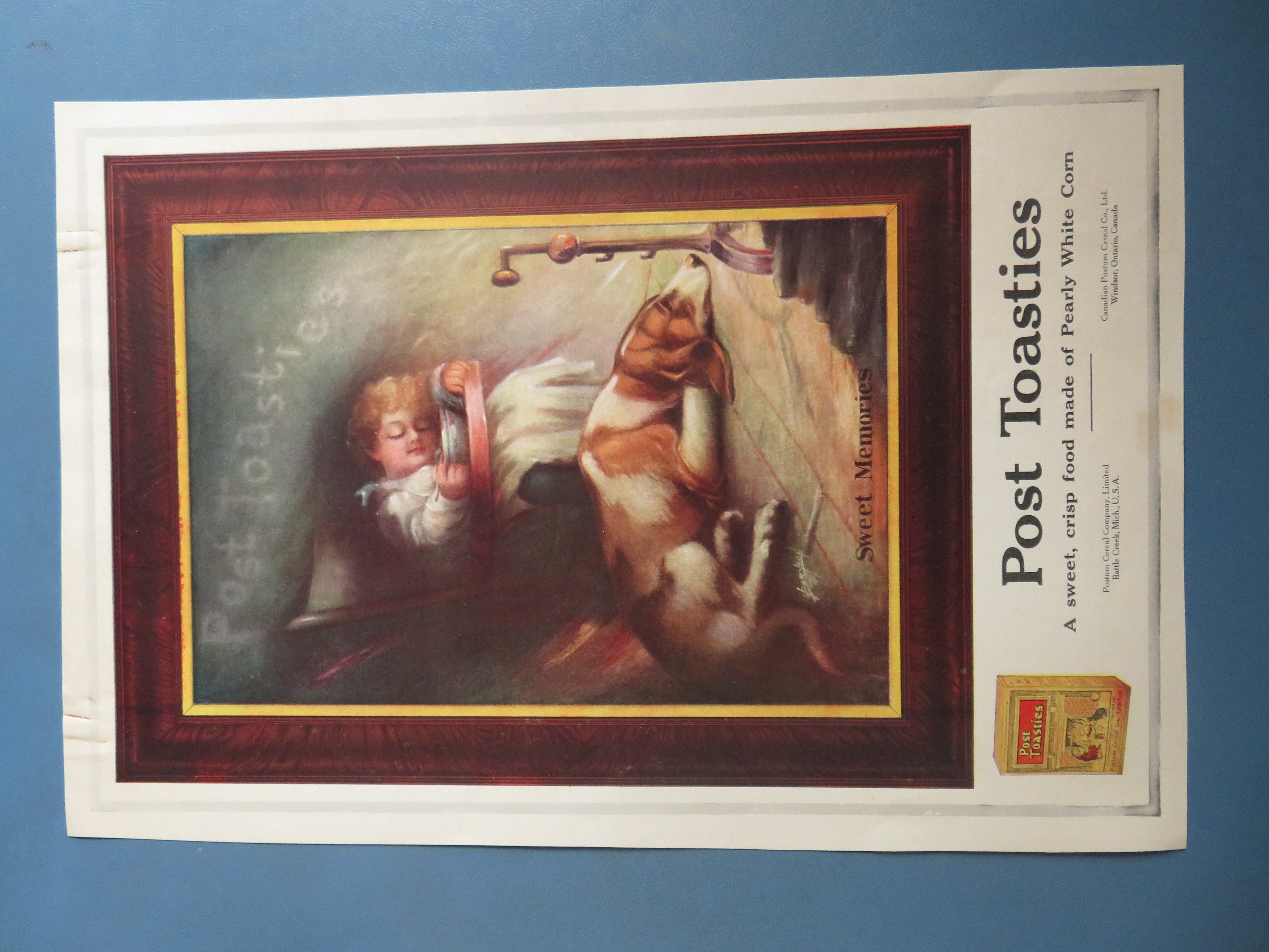 1917 Post Toasties Cereal with Child Sleeping in Chair