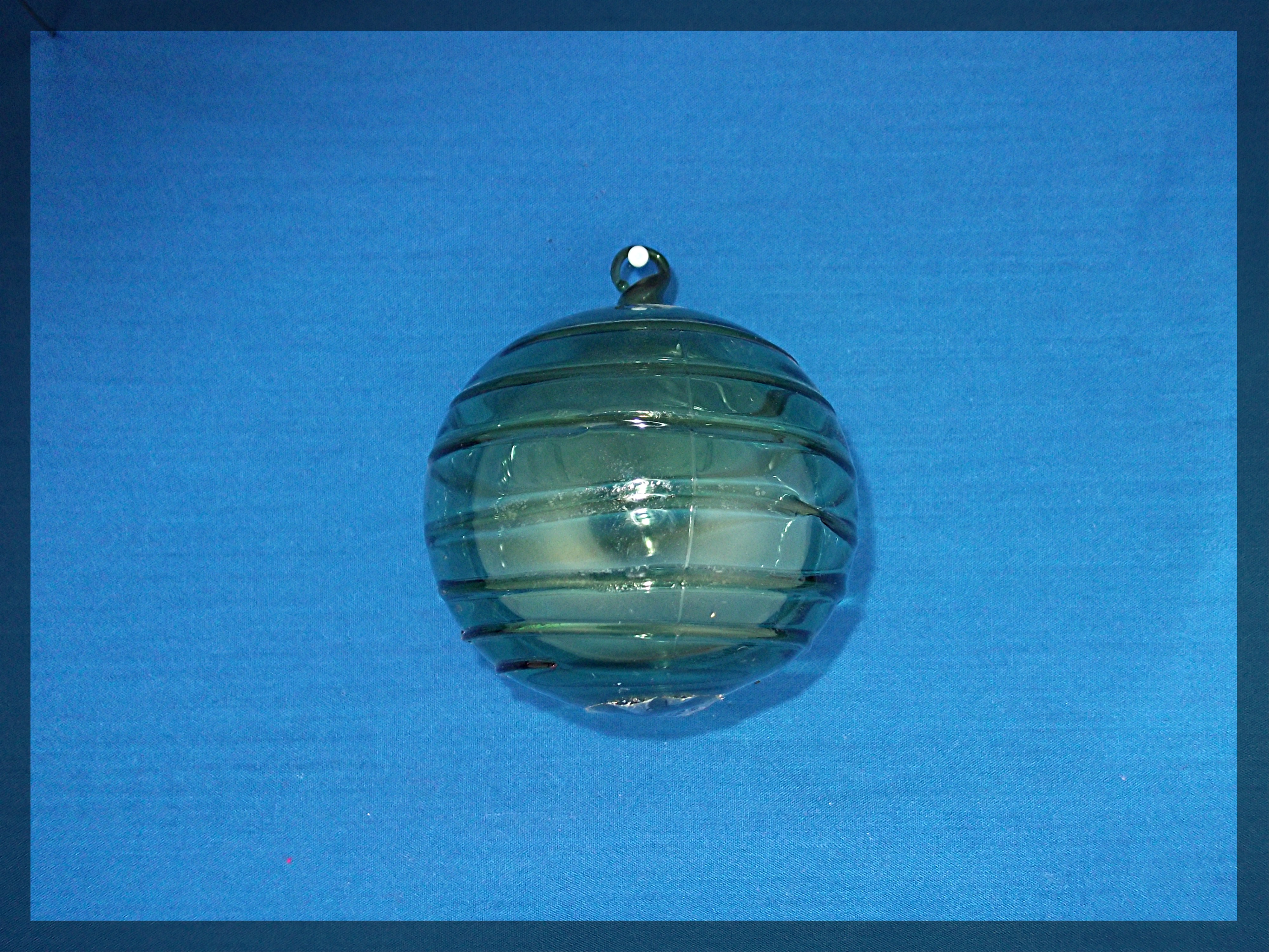 Clear glass hand blown Christmas ornament  . . .