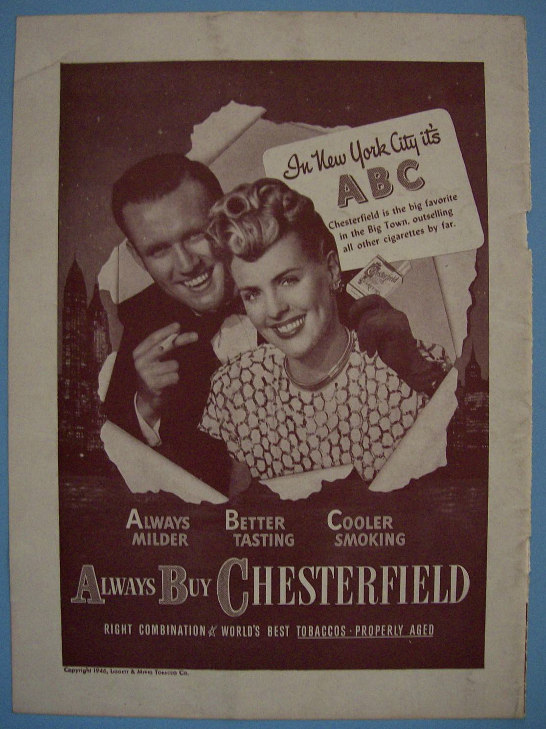 1946 Chesterfield Cigarettes w/ Man Holding a Cigarette