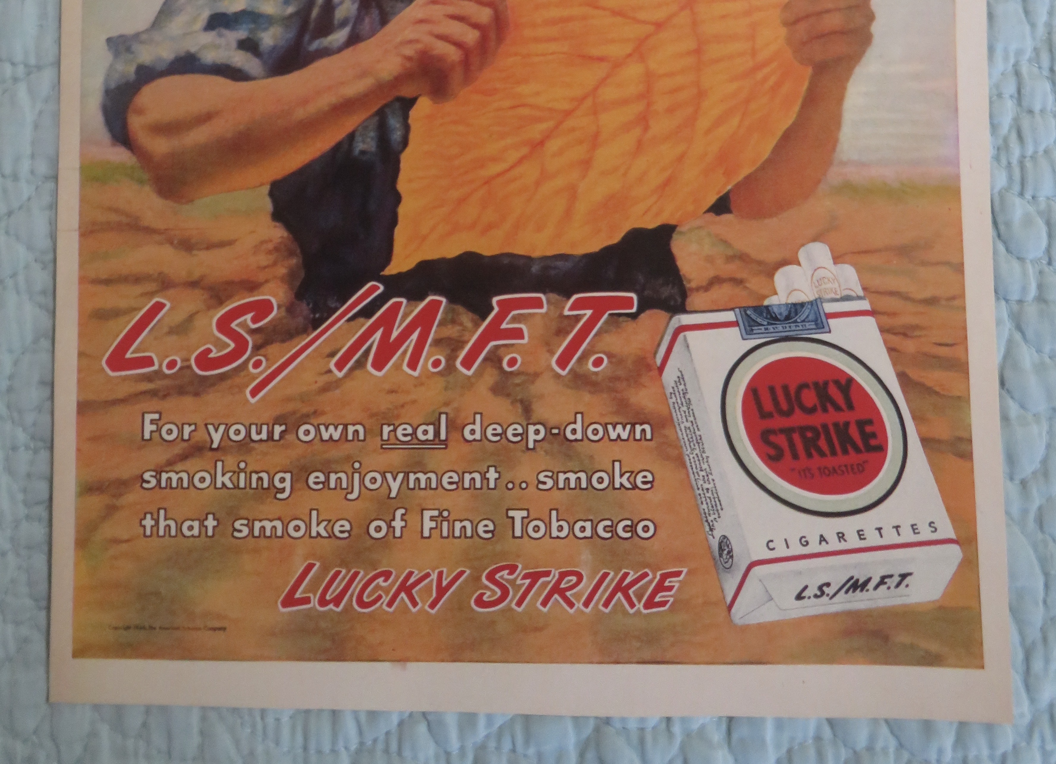 1946 Lucky Strike Cigarettes with Man Looking At Leaf