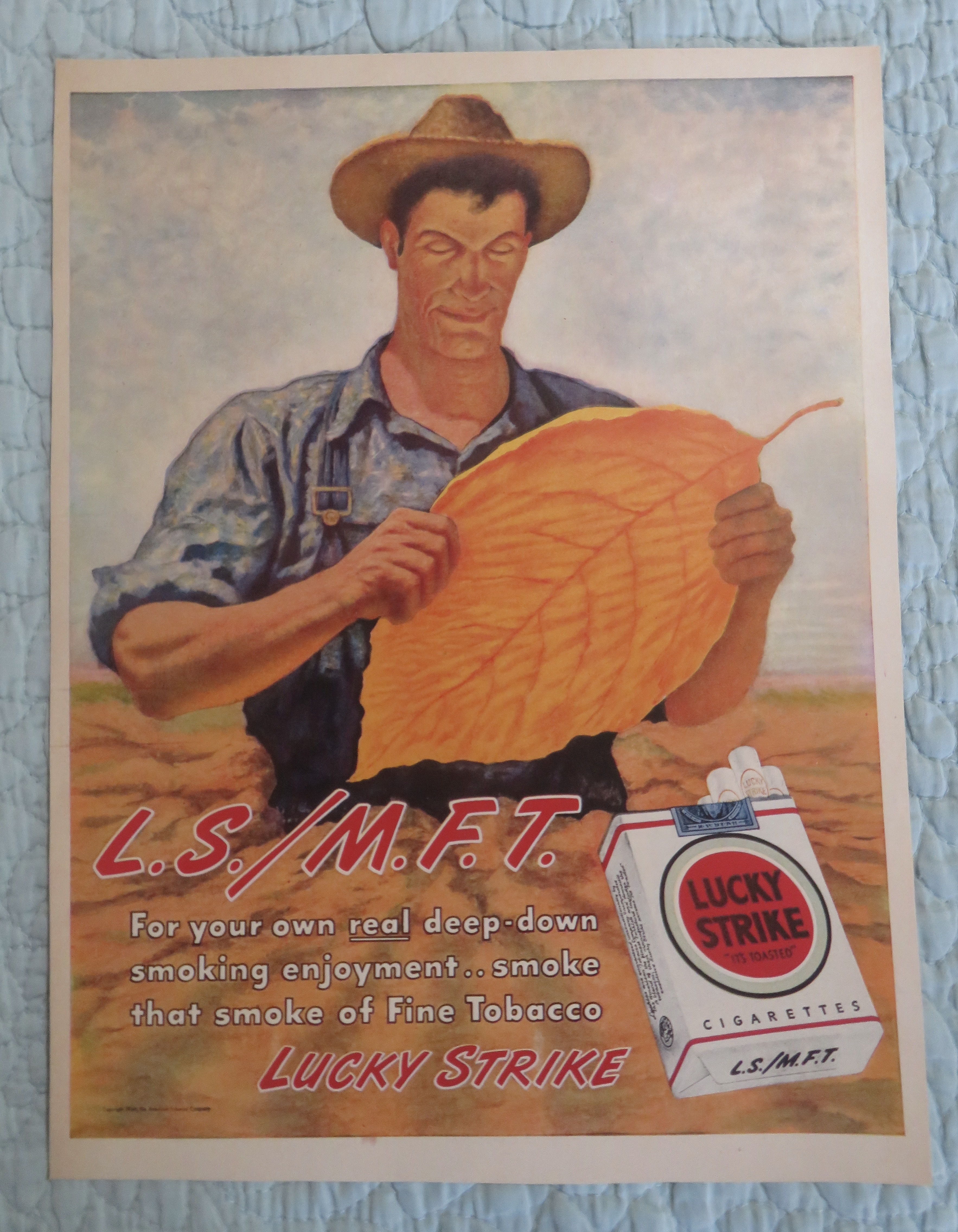 1946 Lucky Strike Cigarettes with Man Looking At Leaf