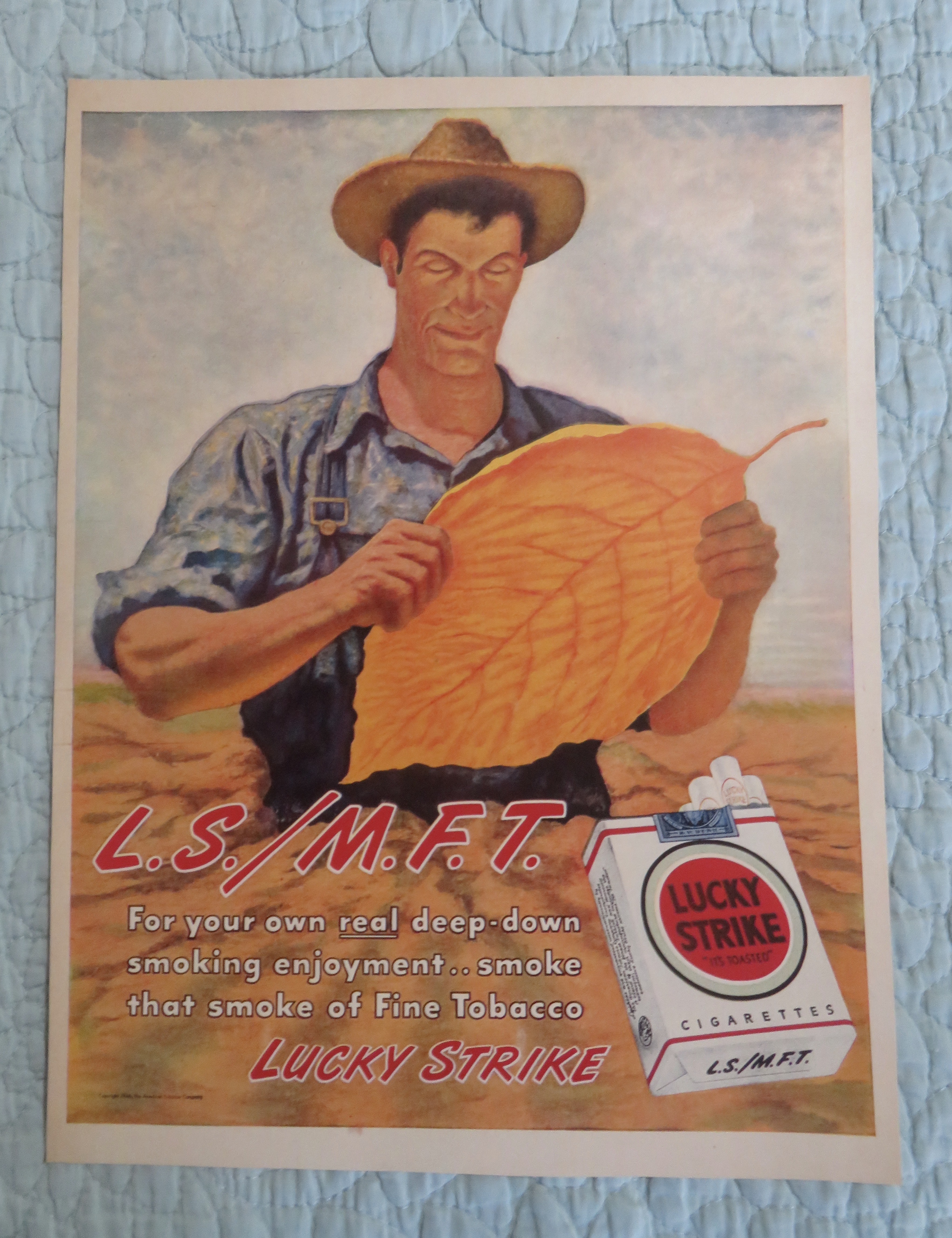 1946 Lucky Strike Cigarettes with Man Looking At Leaf