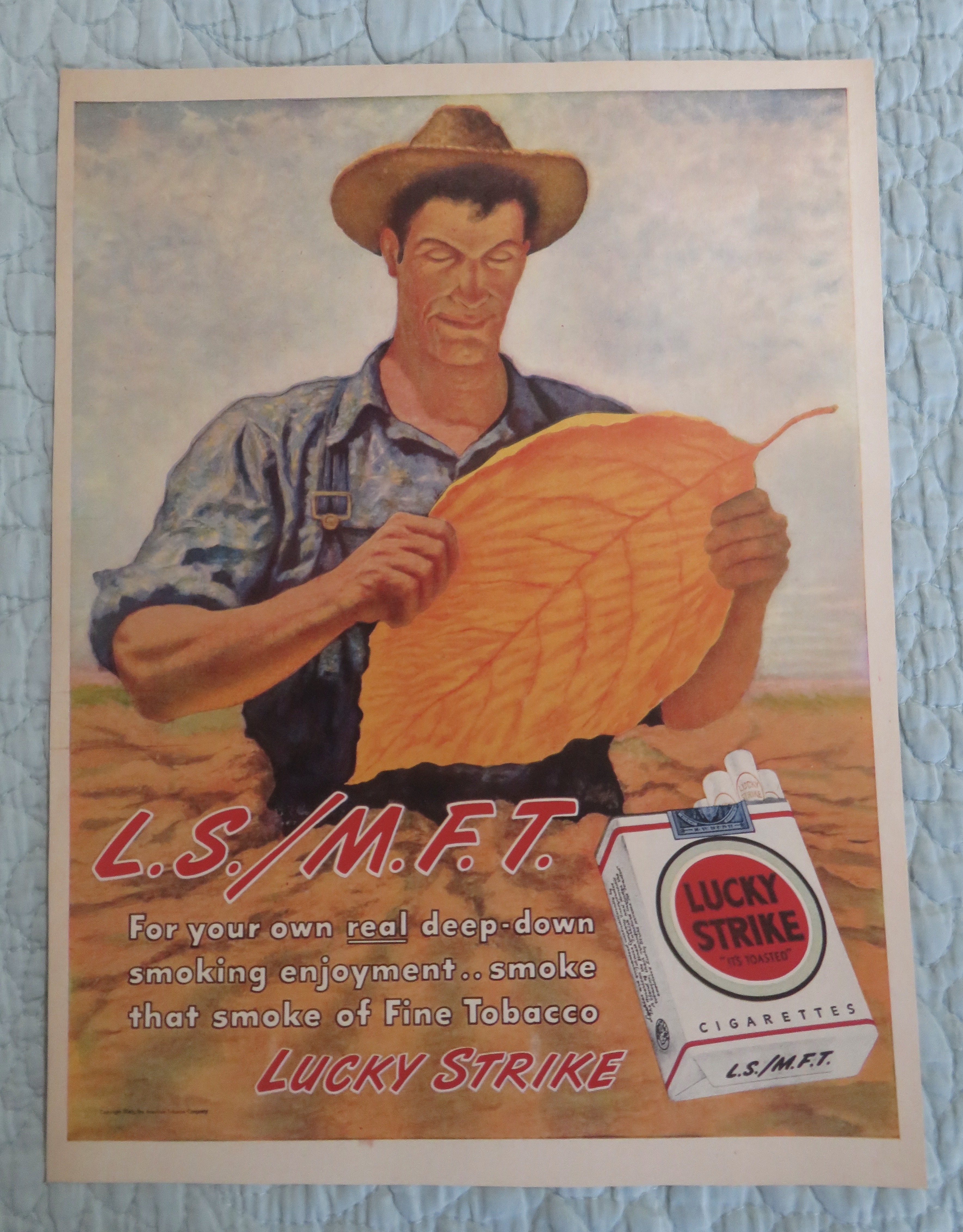 1946 Lucky Strike Cigarettes with Man Looking At Leaf