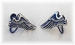 8 Pairs of Silver and Sterling Earrings