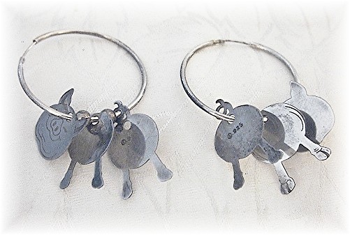 8 Pairs of Silver and Sterling Earrings