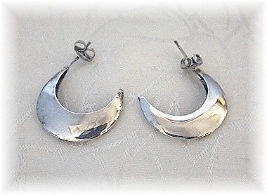 8 Pairs of Silver and Sterling Earrings