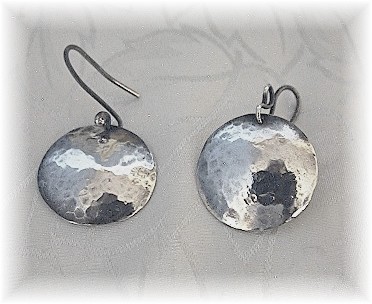 8 Pairs of Silver and Sterling Earrings