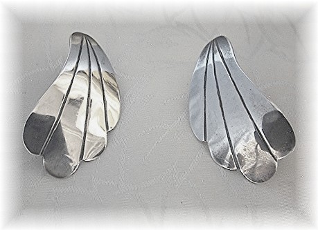 8 Pairs of Silver and Sterling Earrings