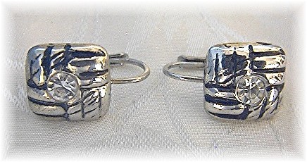 8 Pairs of Silver and Sterling Earrings