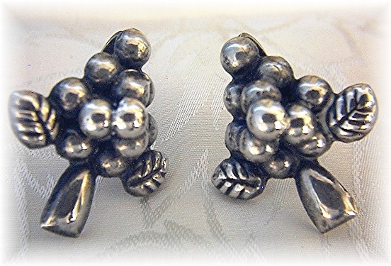 8 Pairs of Silver and Sterling Earrings