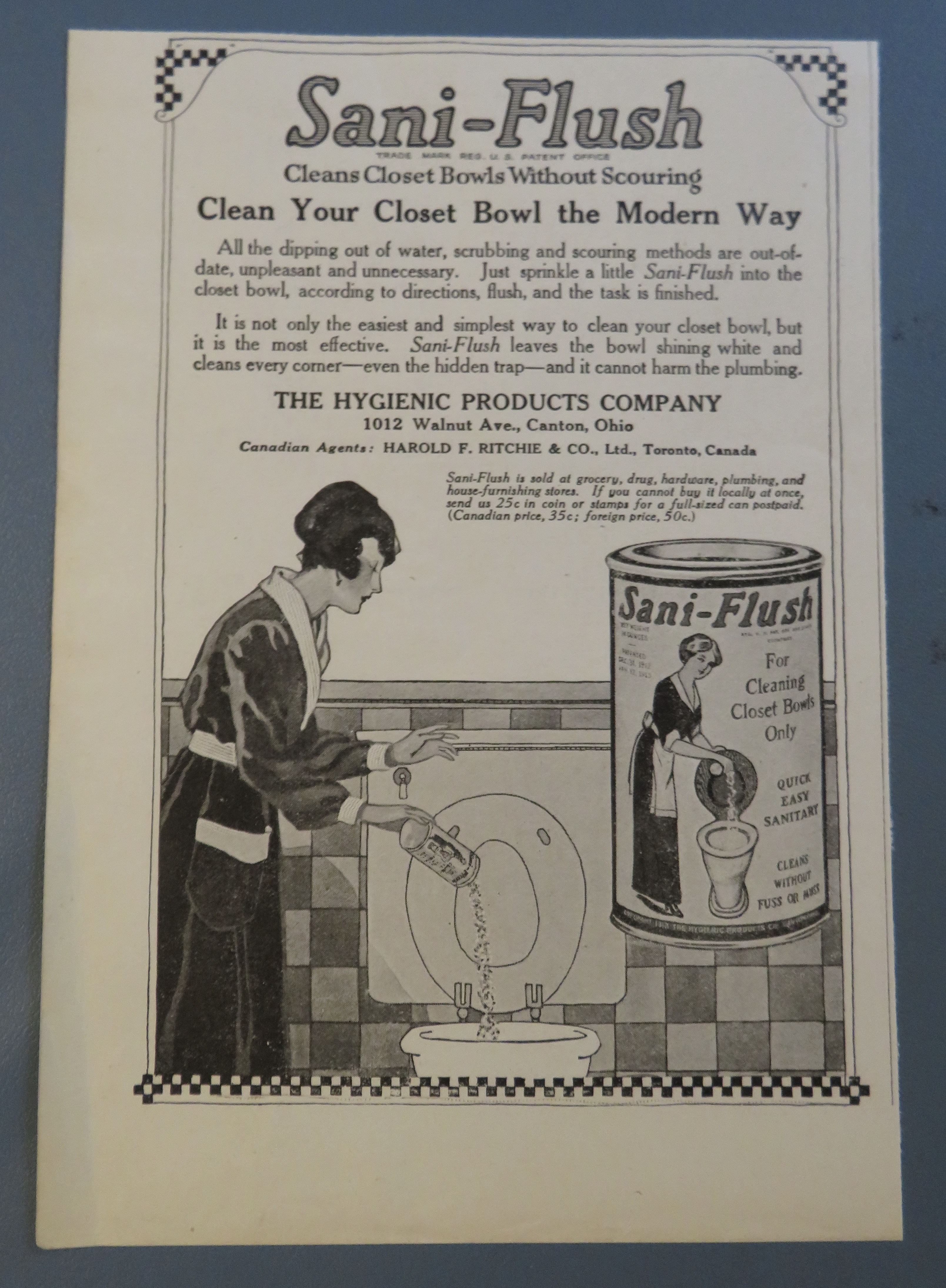 1920 Sani Flush with Woman Cleaning Toilet