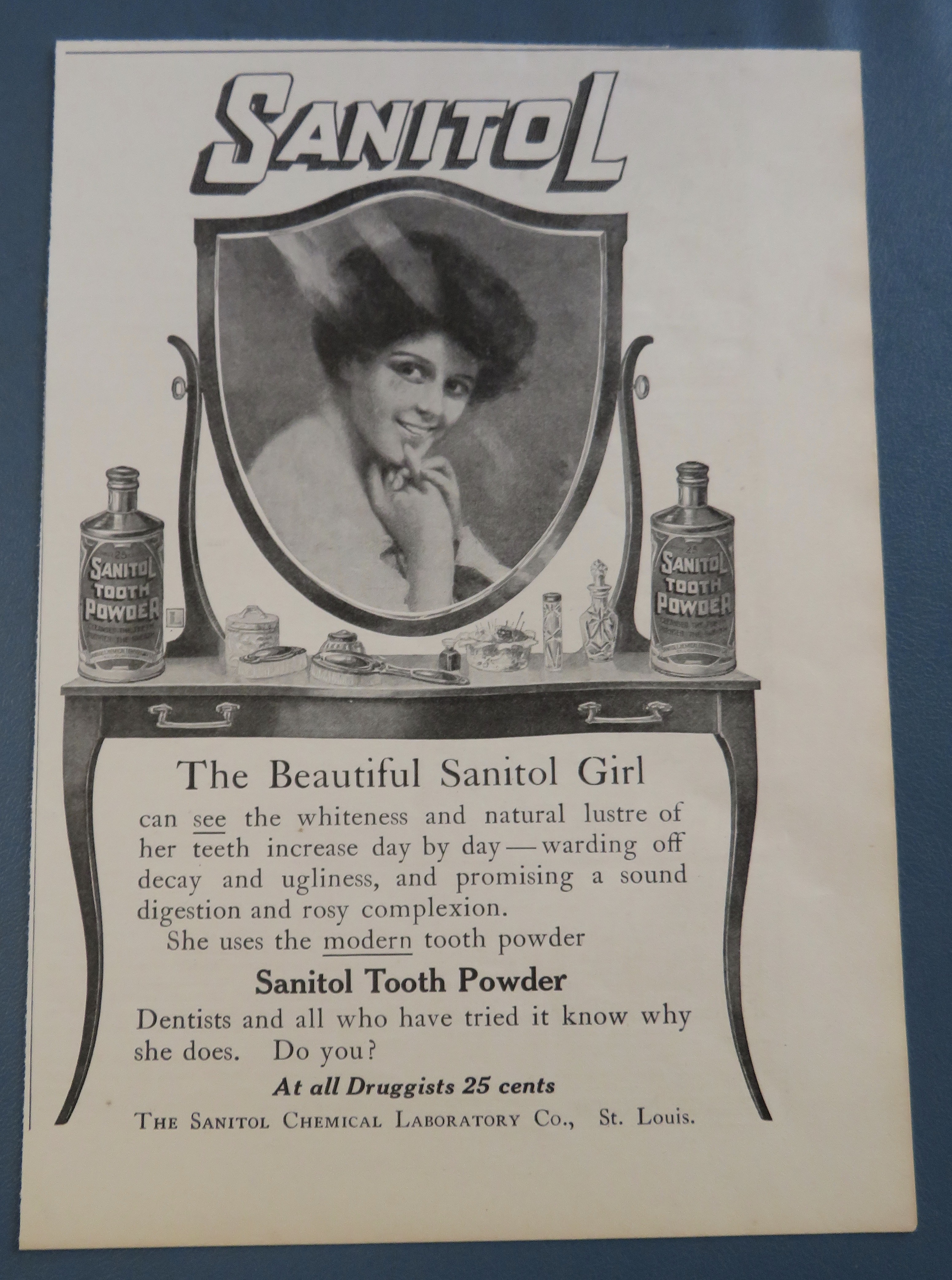 1906 Sanitol Tooth Powder with Woman Smiling In Mirror