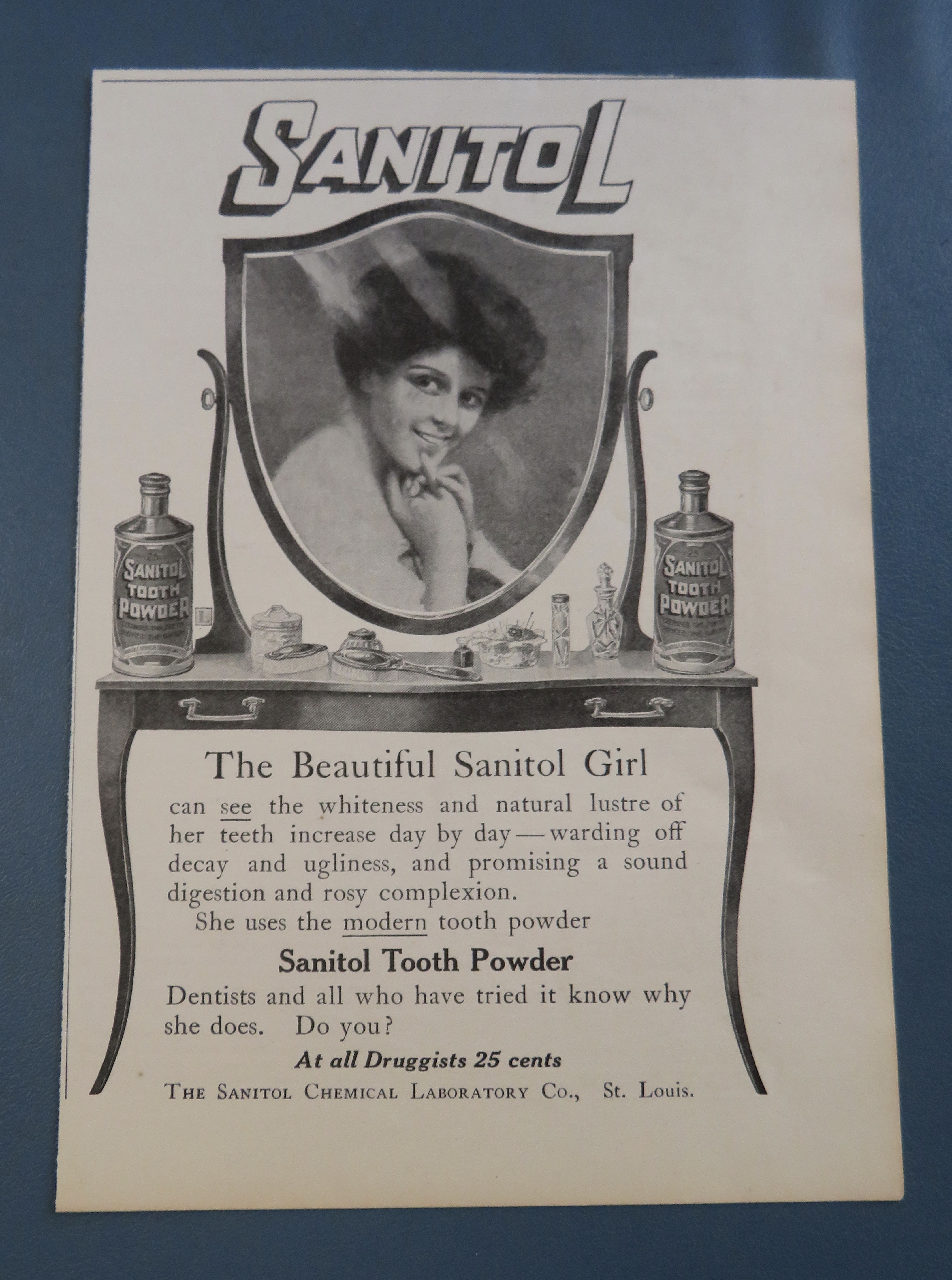 1906 Sanitol Tooth Powder with Woman Smiling In Mirror