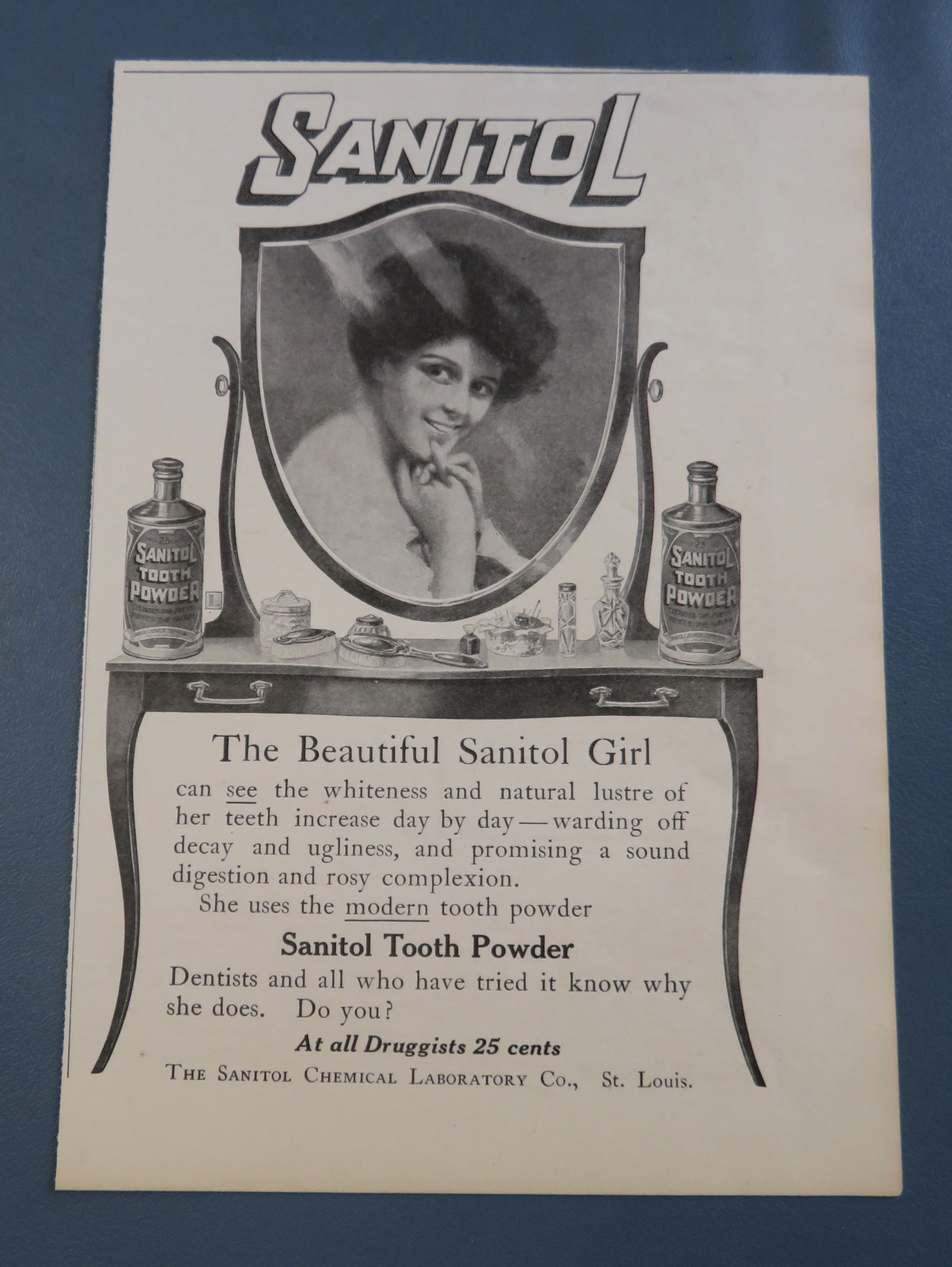 1906 Sanitol Tooth Powder with Woman Smiling In Mirror