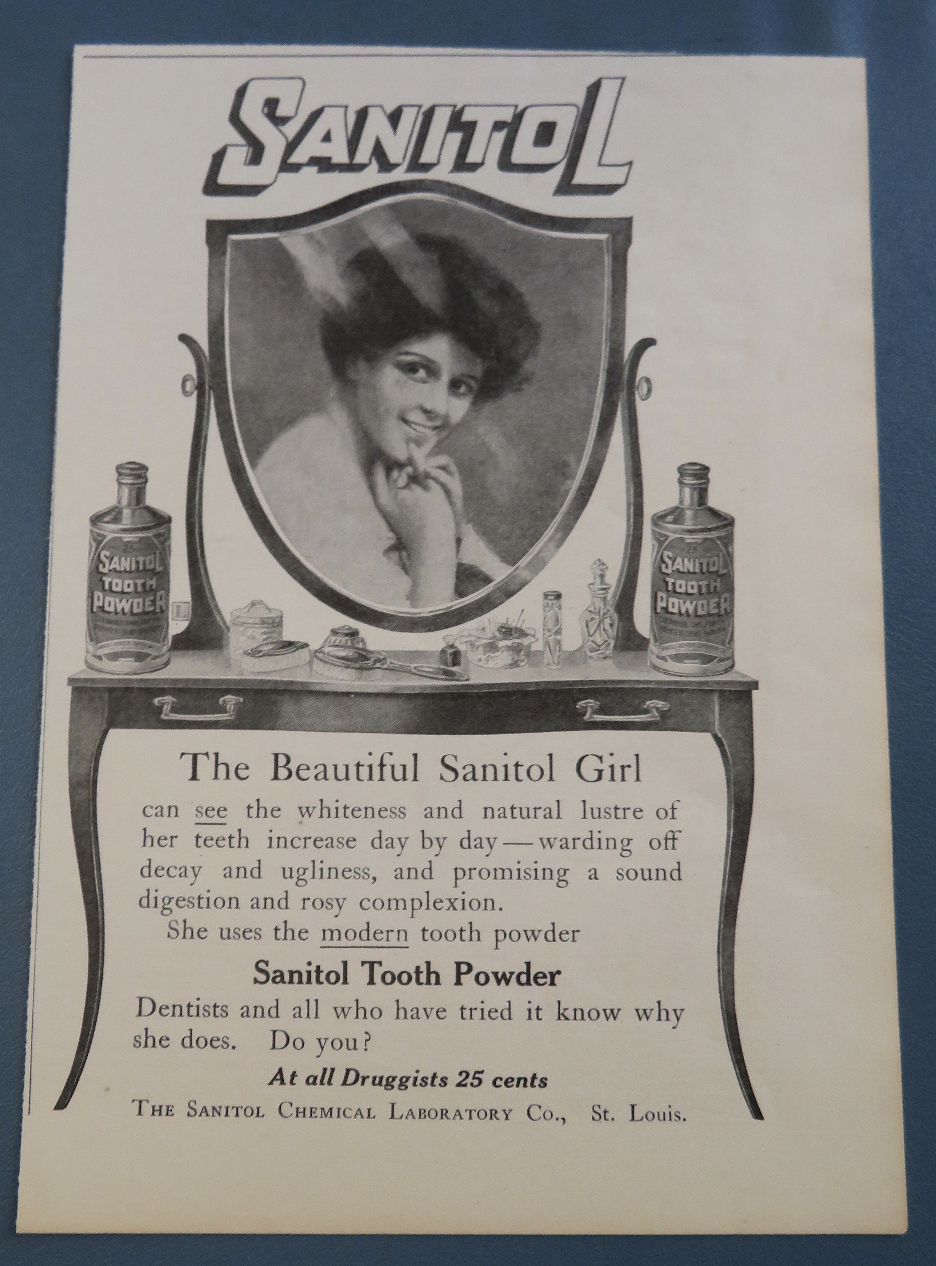 1906 Sanitol Tooth Powder with Woman Smiling In Mirror