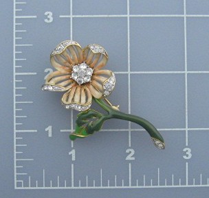 NOLAN MILLER Enamel and Crystal Flower brooch