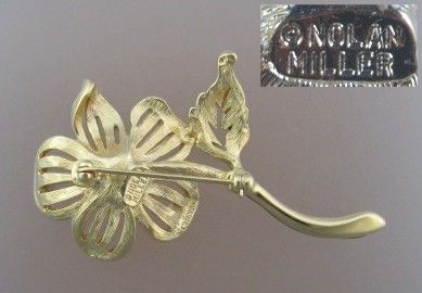 NOLAN MILLER Enamel and Crystal Flower brooch