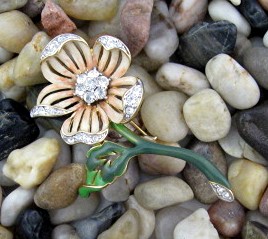 NOLAN MILLER Enamel and Crystal Flower brooch