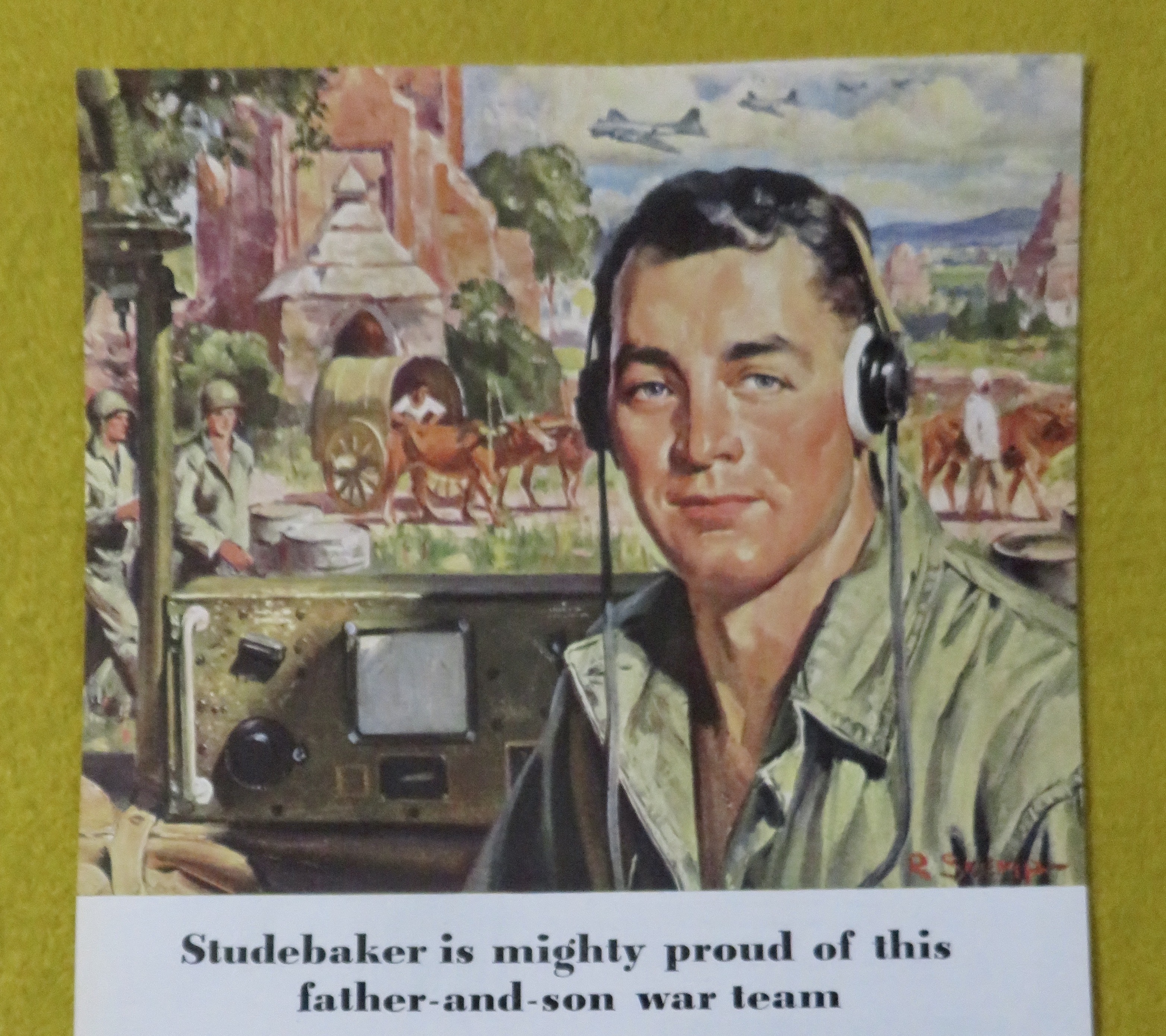 1945 Studebaker with Soldier On A Radio