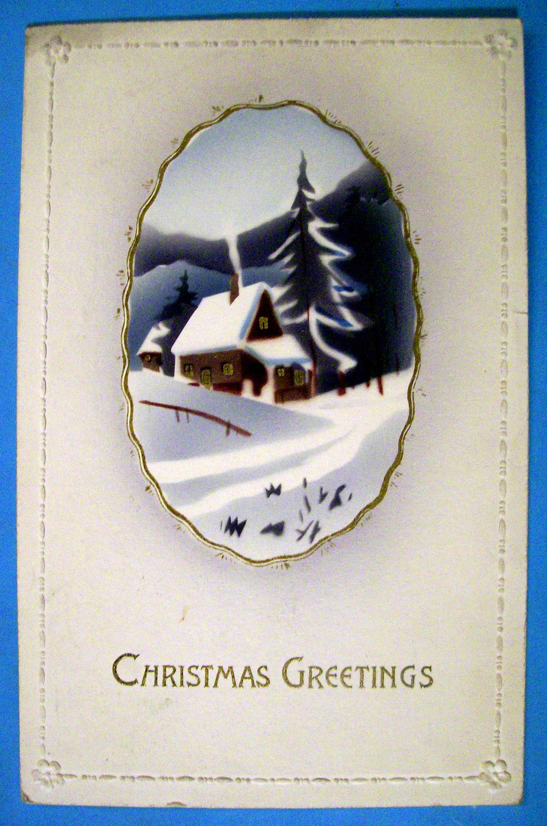 Christmas Greetings Postcard with House Covered in Snow