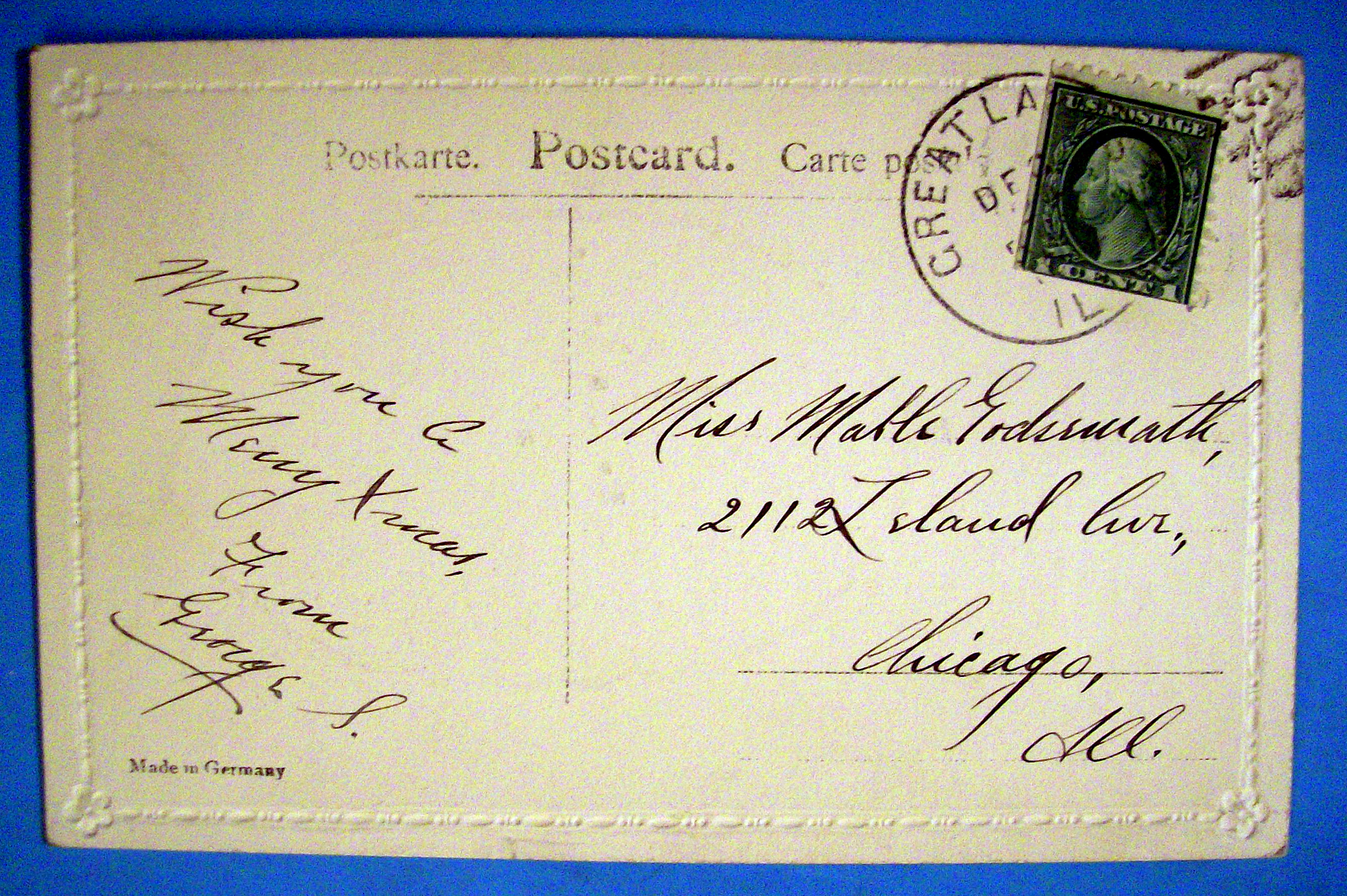 Christmas Greetings Postcard with House Covered in Snow