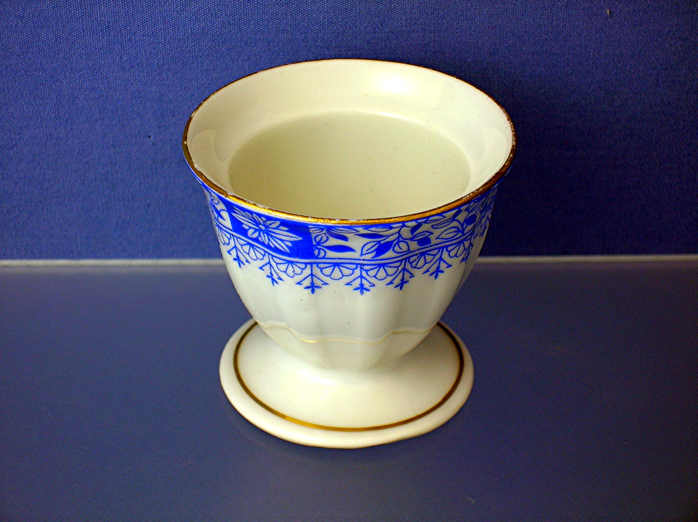 Egg Cup with blue design and gold rim.....