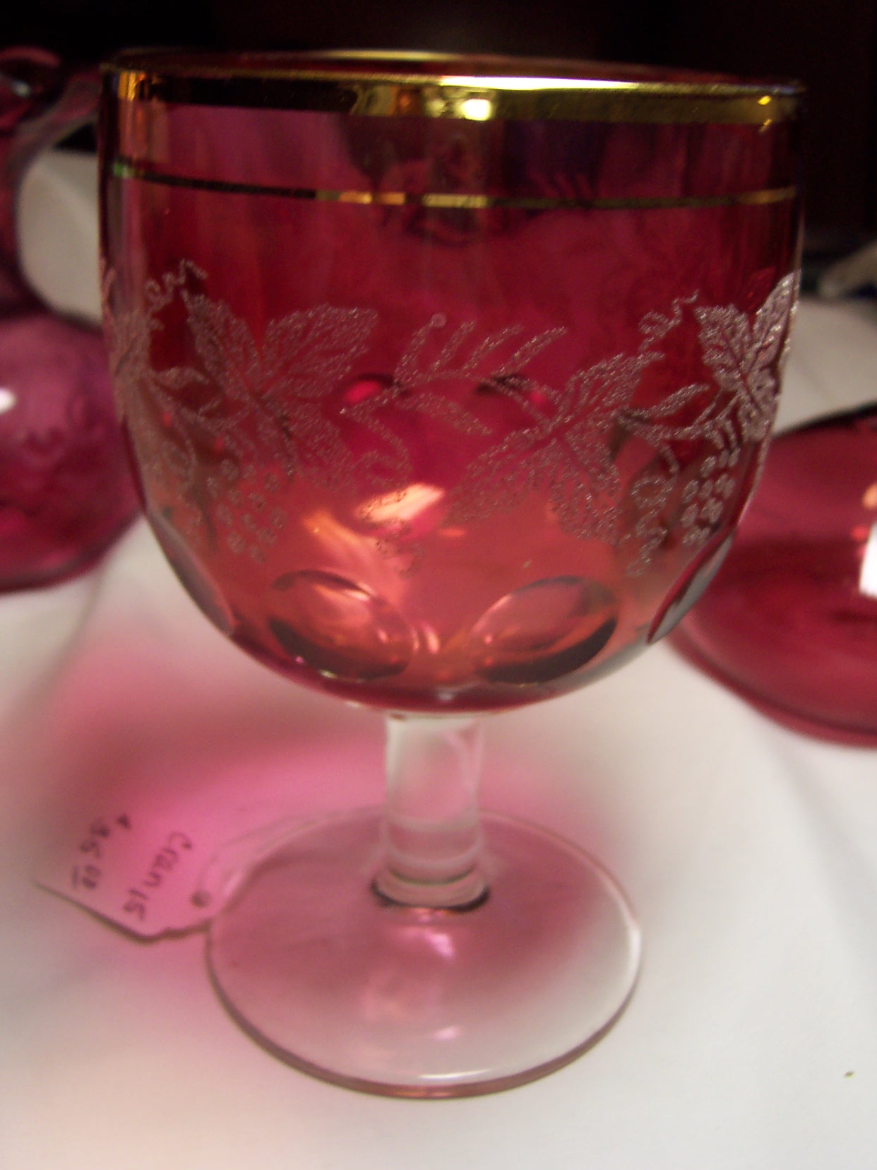 Cranberry Glass Thumbprint Goblet Grapevine