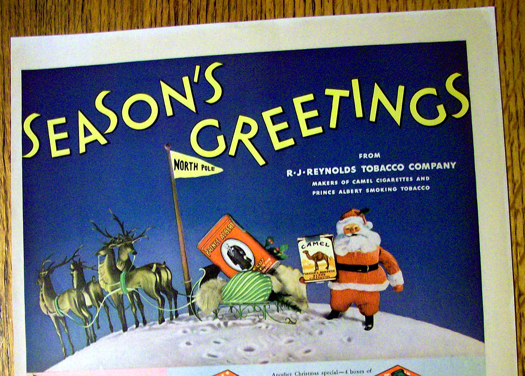 1936 Camel Cigarettes with Santa Claus Holding Pack