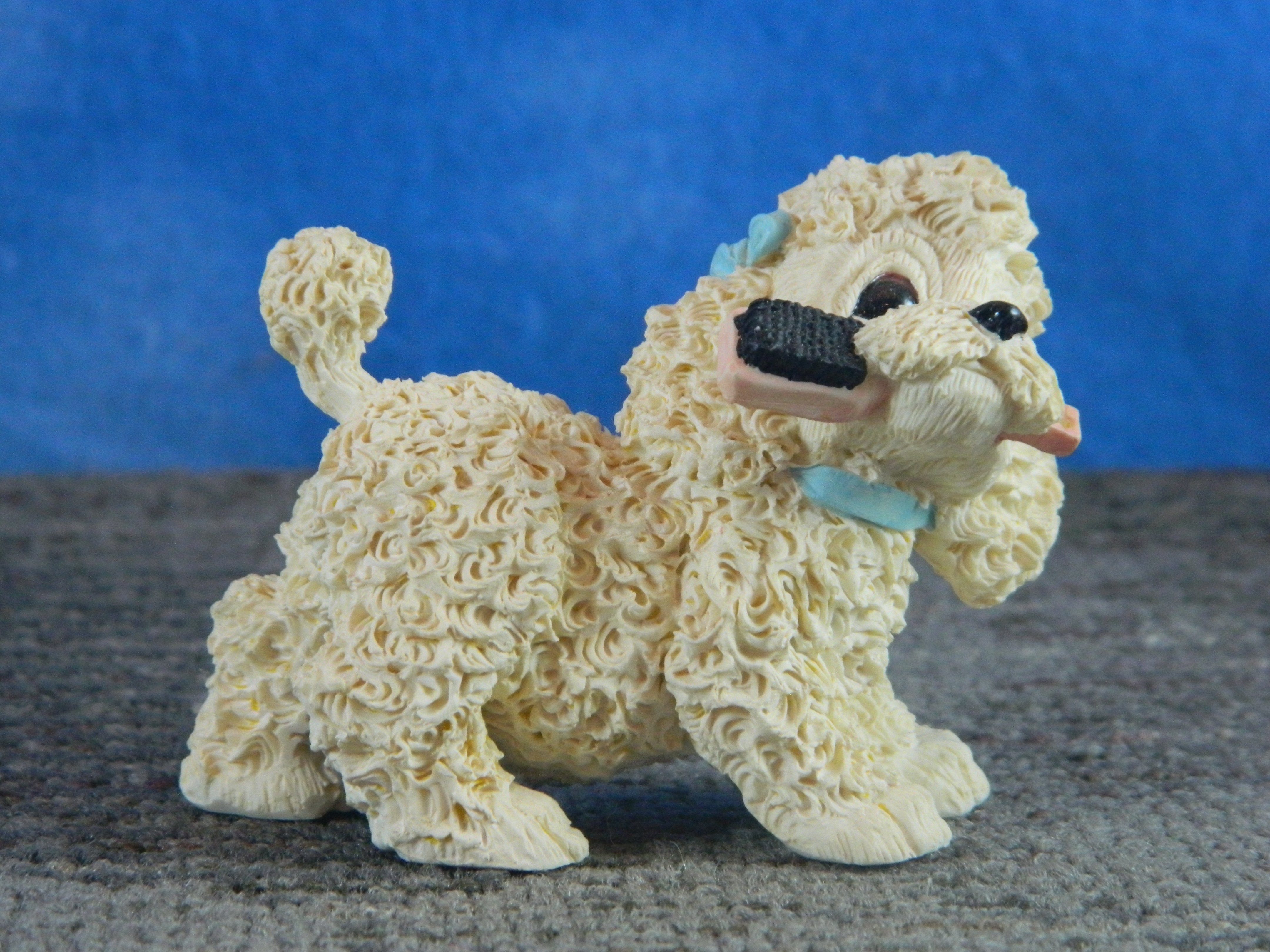 Enesco 1992 Kathy Wise Poodle Carrying a Hair Brush