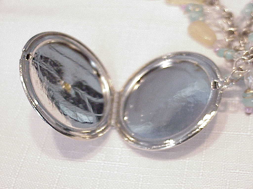 Silver Tone Necklace With Locket And Dangling Beads
