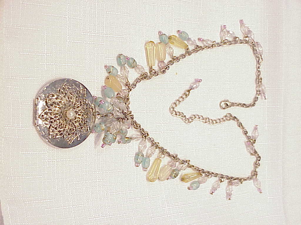 Silver Tone Necklace With Locket And Dangling Beads